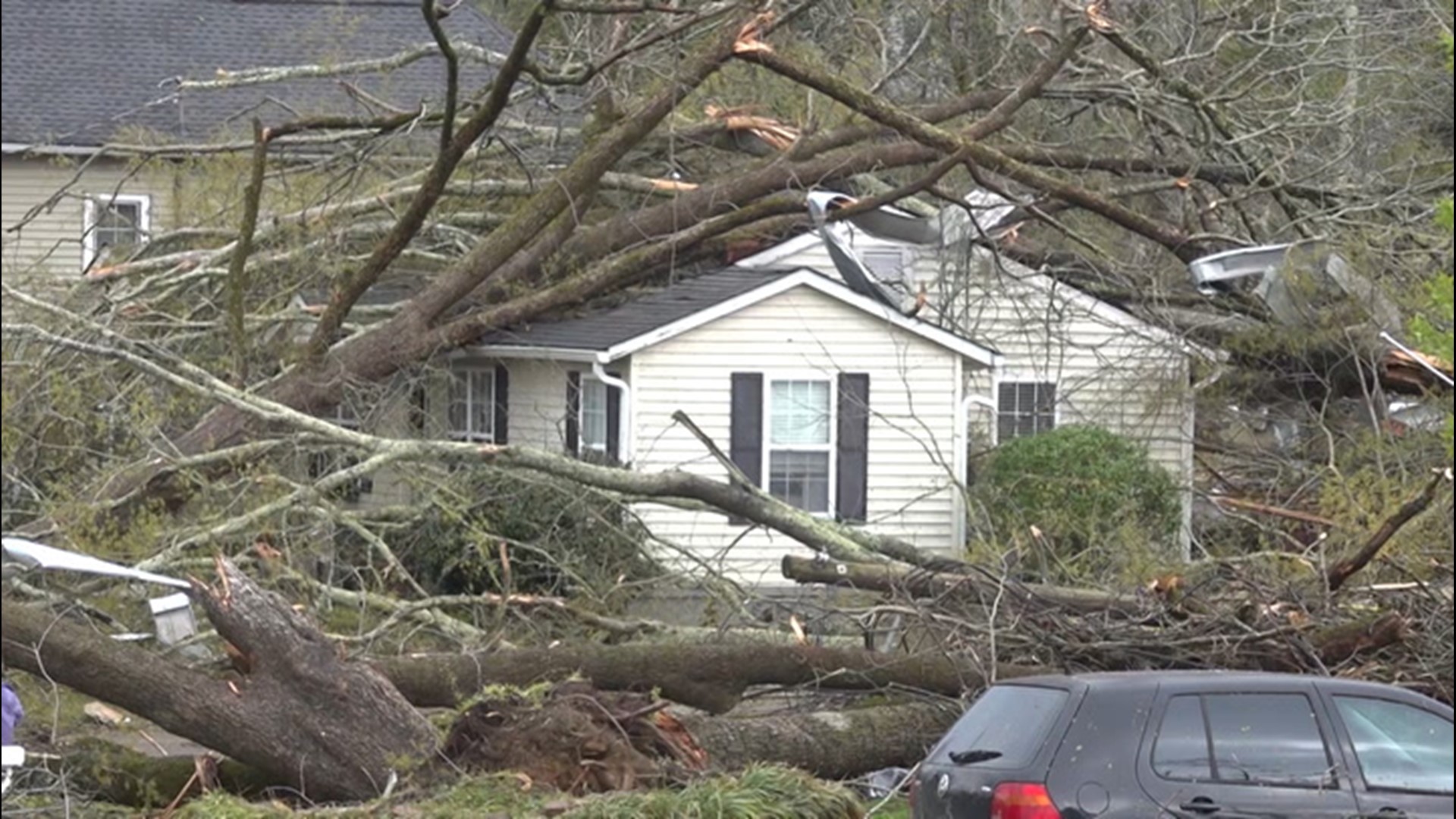 Several trees were down and homes damaged or destroyed as the storm hit the town overnight Thursday.