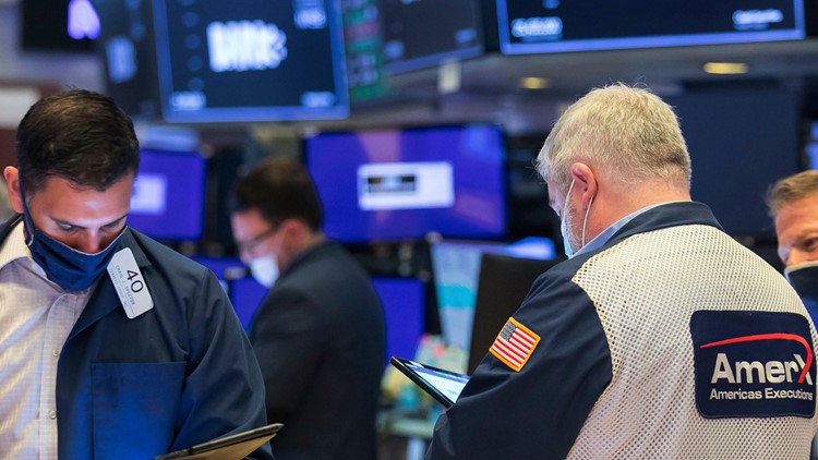 Stocks end lower on Wall Street after another volatile day