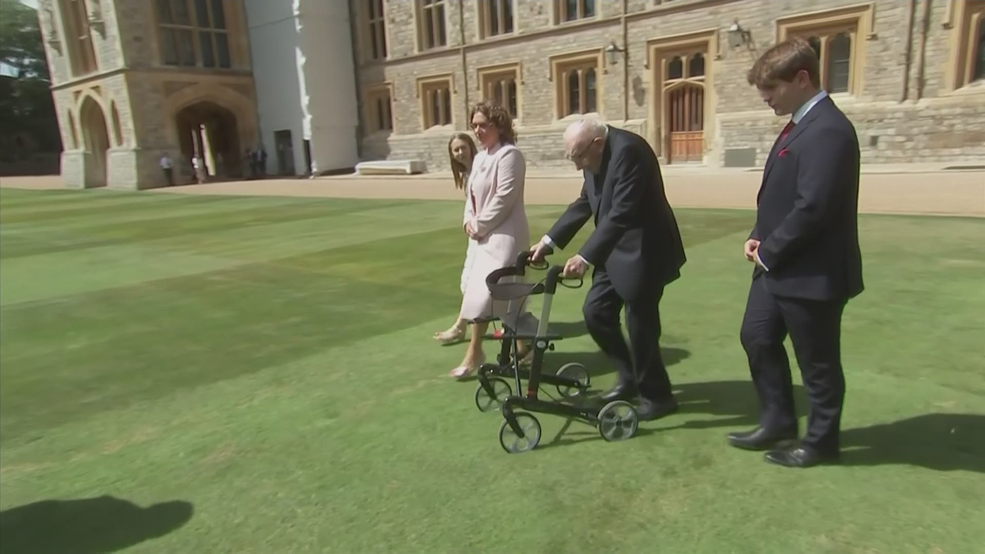 Britain's Captain Tom Moore, who made headlines for his fundraising efforts during the coronavirus pandemic, was knighted Friday by Queen Elizabeth II.