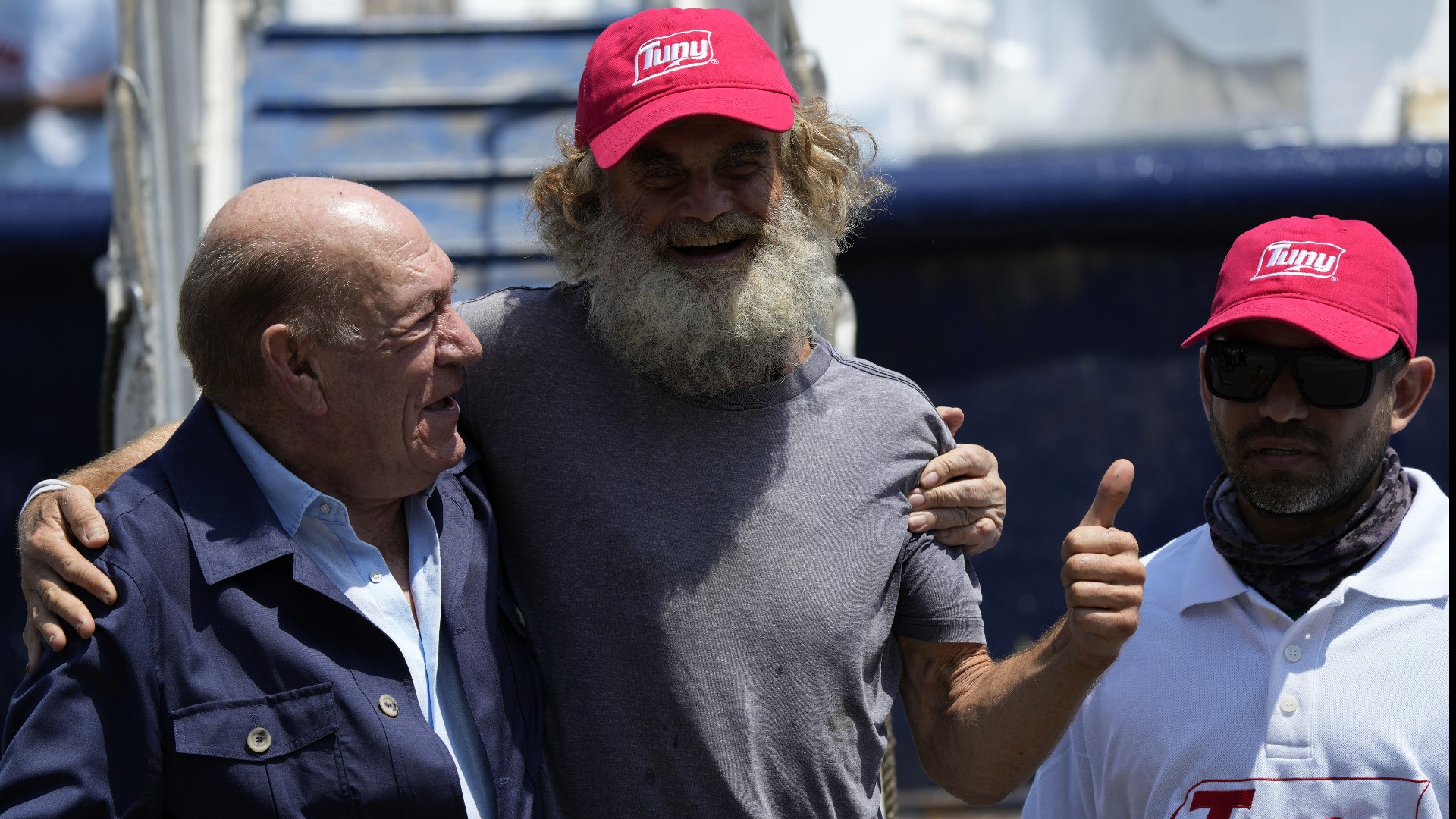 An Australian sailor who was rescued by a Mexican tuna boat after being adrift at sea with his dog for three months, set foot on dry land Tuesday.