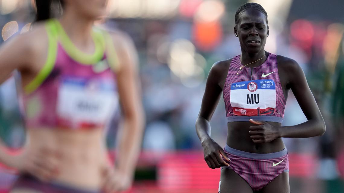 Olympic champ Athing Mu’s hopes for repeat title end after fall | krem.com