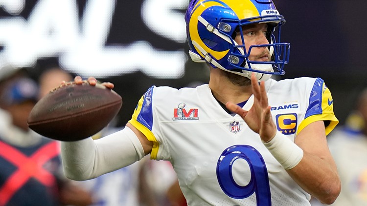 Los Angeles, United States. 14th Feb, 2022. Los Angeles Rams quarterback Matthew  Stafford (L) and offensive tackle Andrew Whitworth hold the Vince Lombardi  Trophy while celebrating after the Rams defeated the Cincinnati