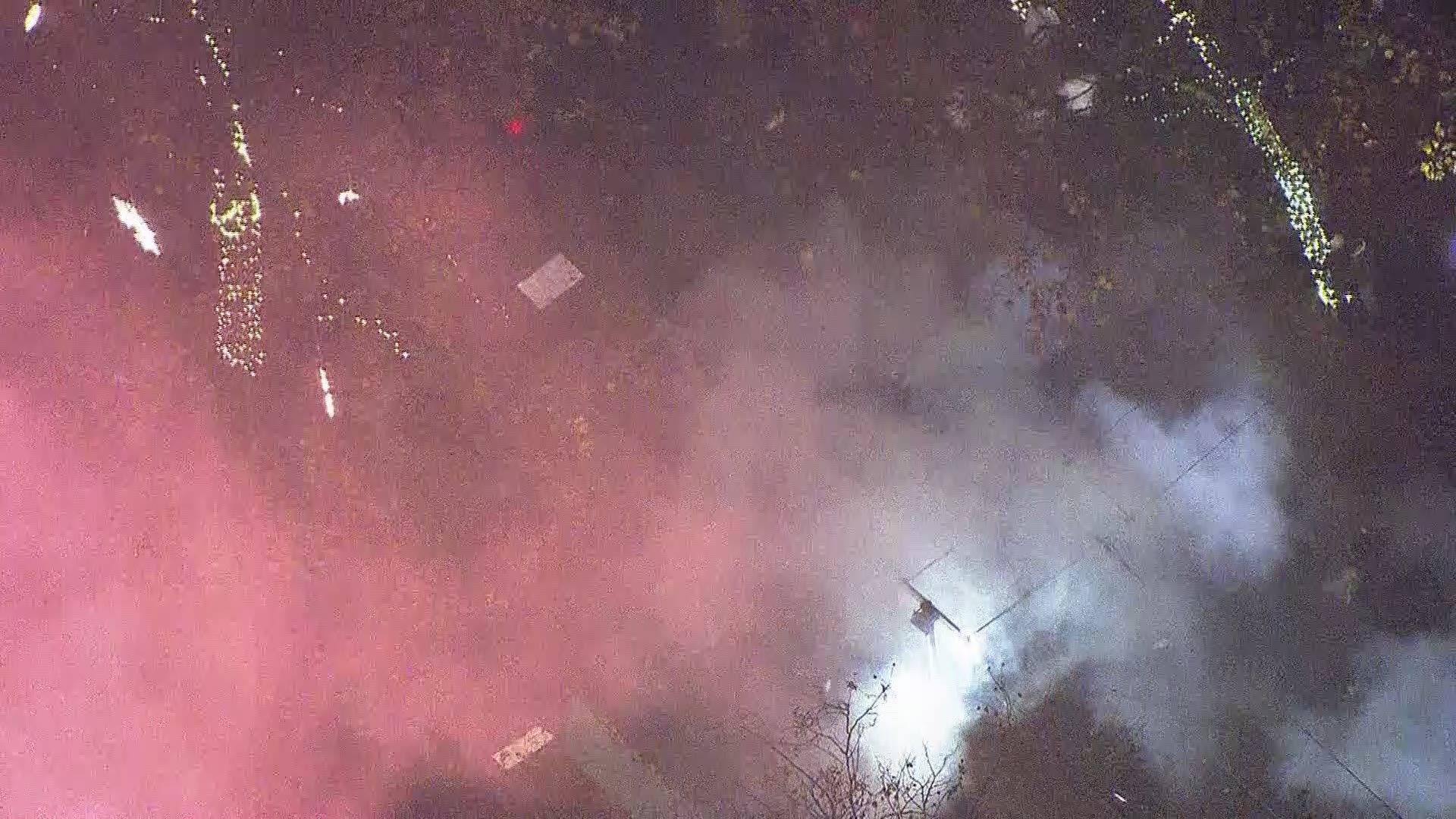 Police use flash bangs, smoke bombs to deter protesters