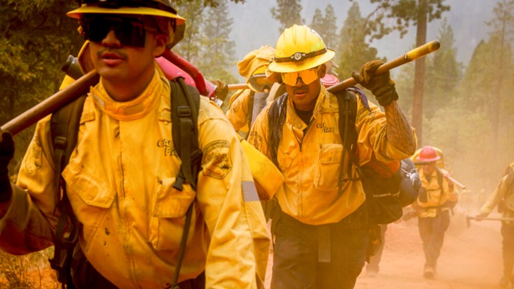 Wildfires in West explode in size amid hot, windy conditions
