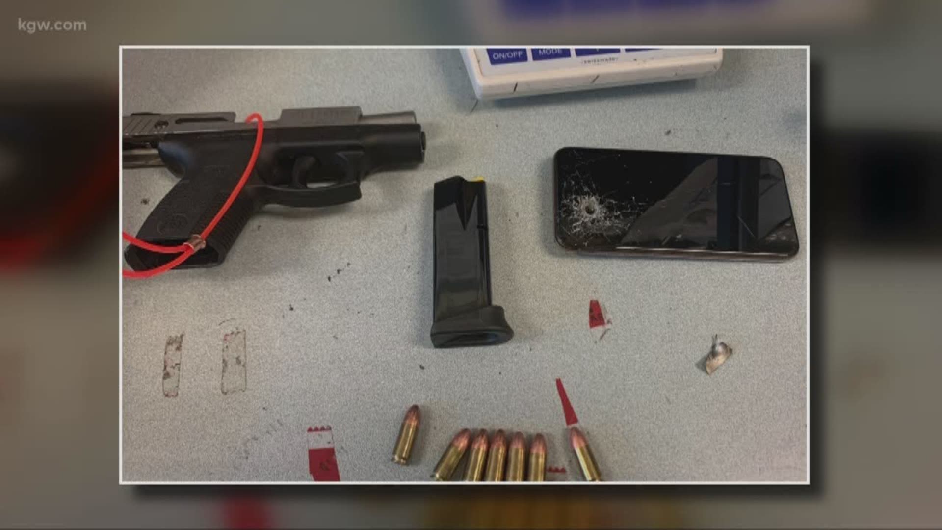 A woman fired a gun during a New Year's celebration inside a condo in North Bethany, and the bullet went through her cell phone and her neighbor's wall.