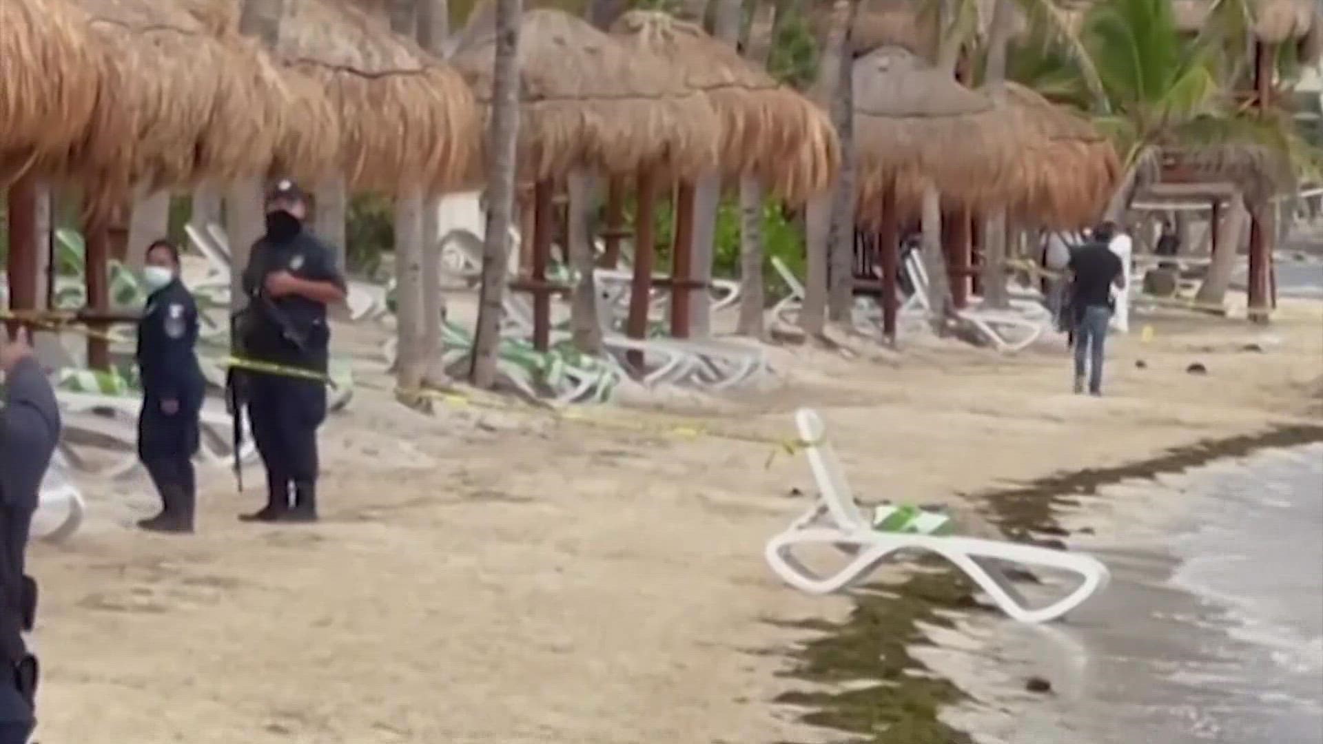 Prosecutors say two men were killed by a rival gang of about a dozen masked commandos Thursday at the Hyatt Ziva Riviera Cancun where tourists ran for cover.