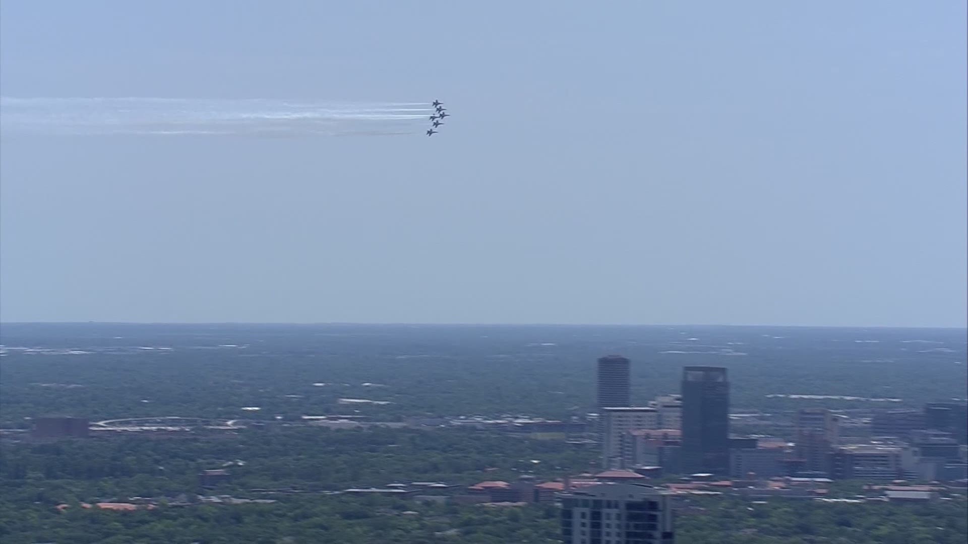 Sunshine and blue skies created the perfect backdrop for the Blue Angels as they flew over the Texas Medical Center in Houston.