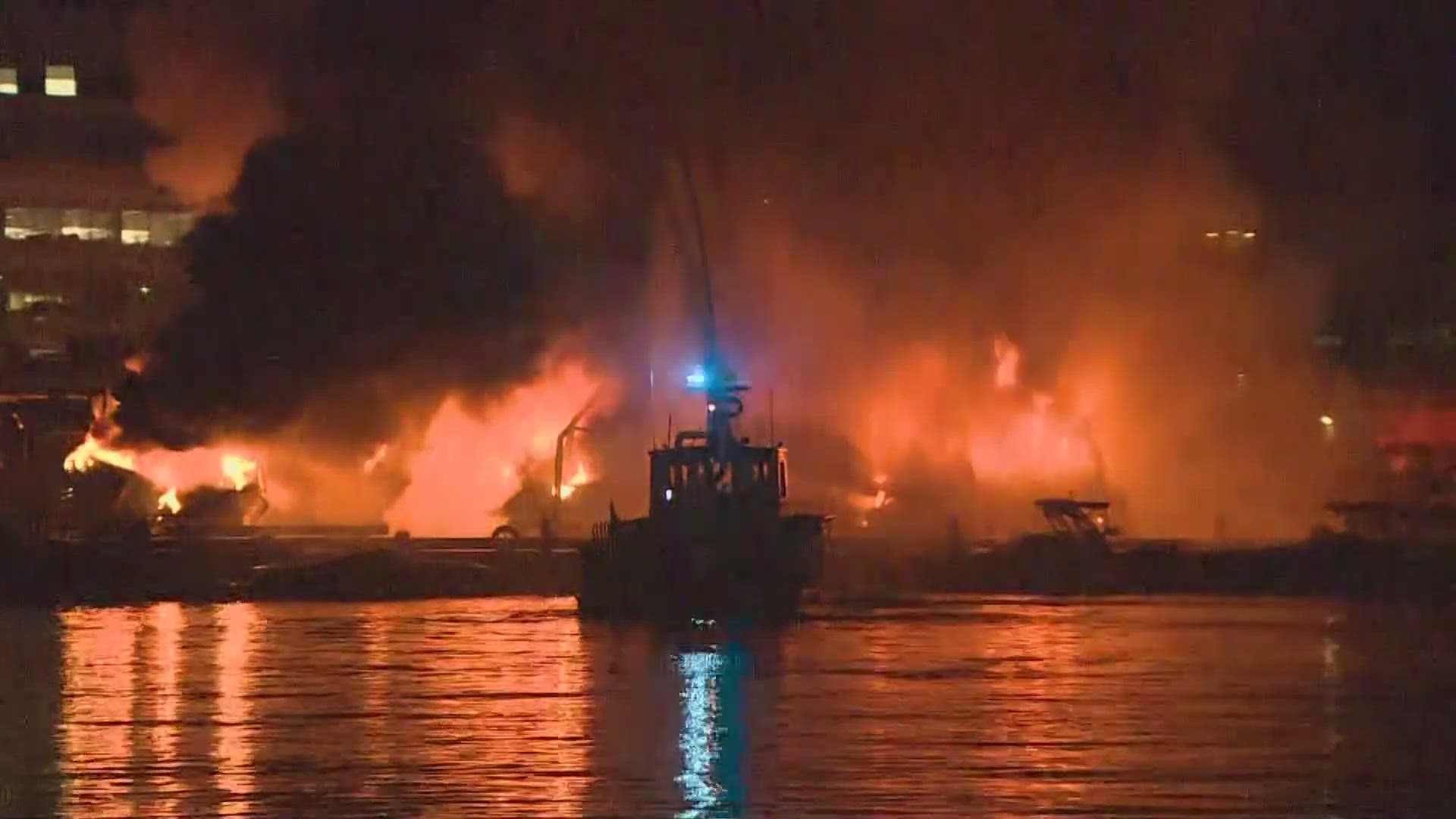 About 30 boats were destroyed in a fire on Lake Union near the Ship Canal Bridge early Wednesday morning.
