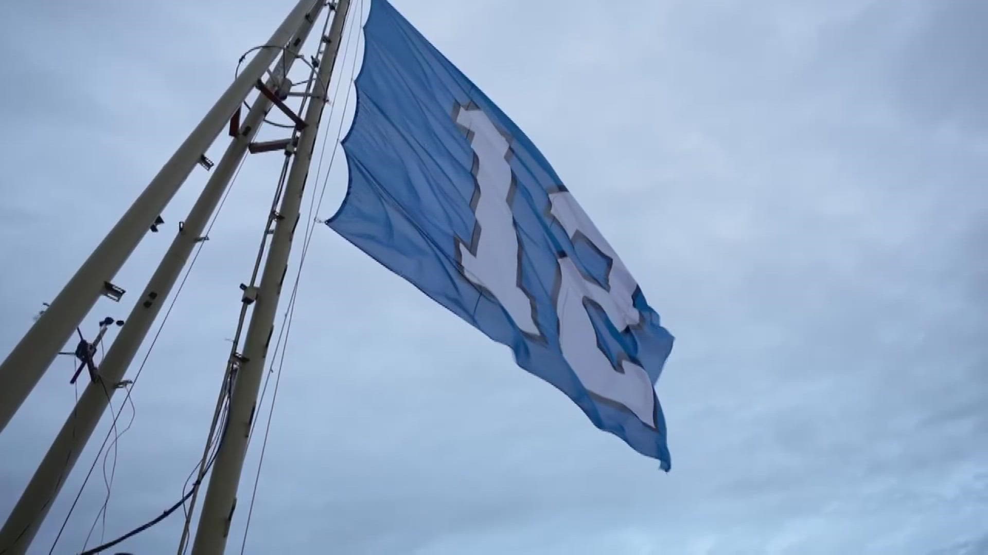 Representatives from the Seahawks, the Seattle Storm, OL Reign and the Seattle Mariners helped raise the flag above the Emerald City's most iconic attraction.