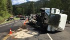 10,000 gallons of liquid asphalt spill in semi crash