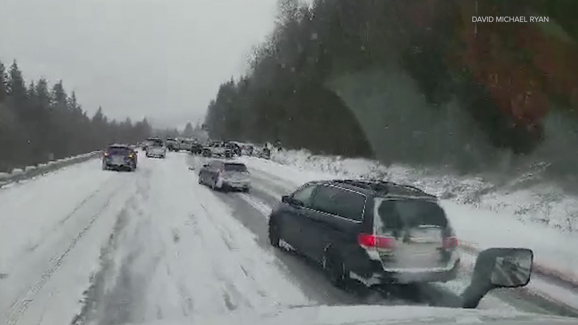 Westbound I-90 was shut down near North Bend following 15 collisions, including 3 rollovers, on Feb. 13.