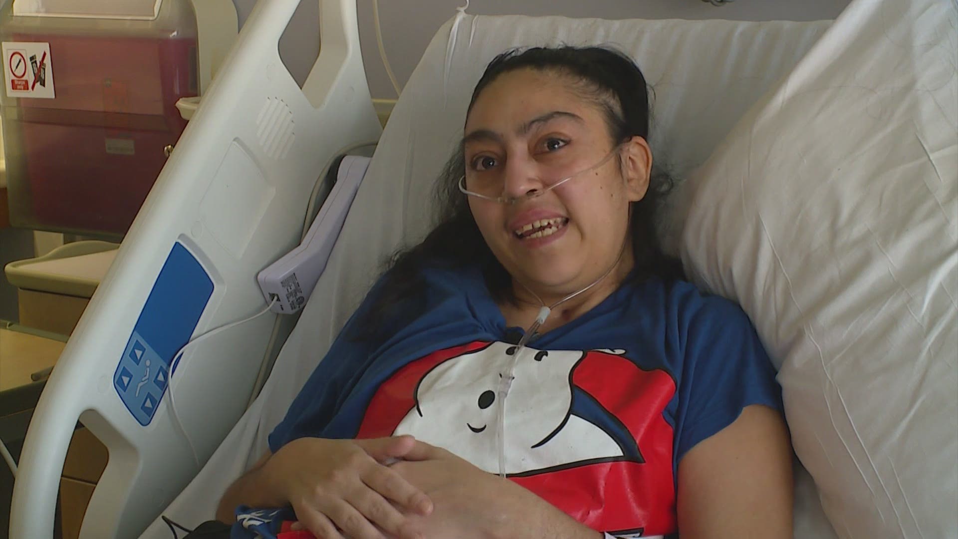 Hospital staff cheered as Jenny Aguilar, 32, a mother of five, walked out on her own, Tuesday. Doctors went to extraordinary lengths to save her life.