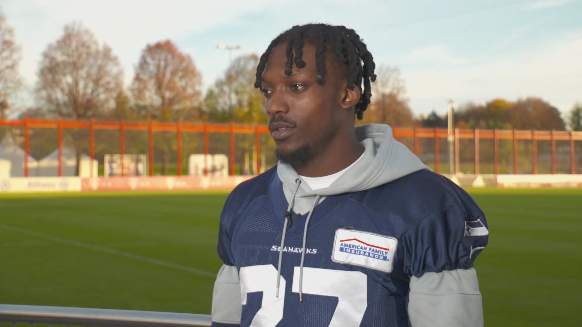 Tariq Woolen explains what he has liked about the Seahawks' trip to Germany this week, and his reaction to trying the local food in Munich.