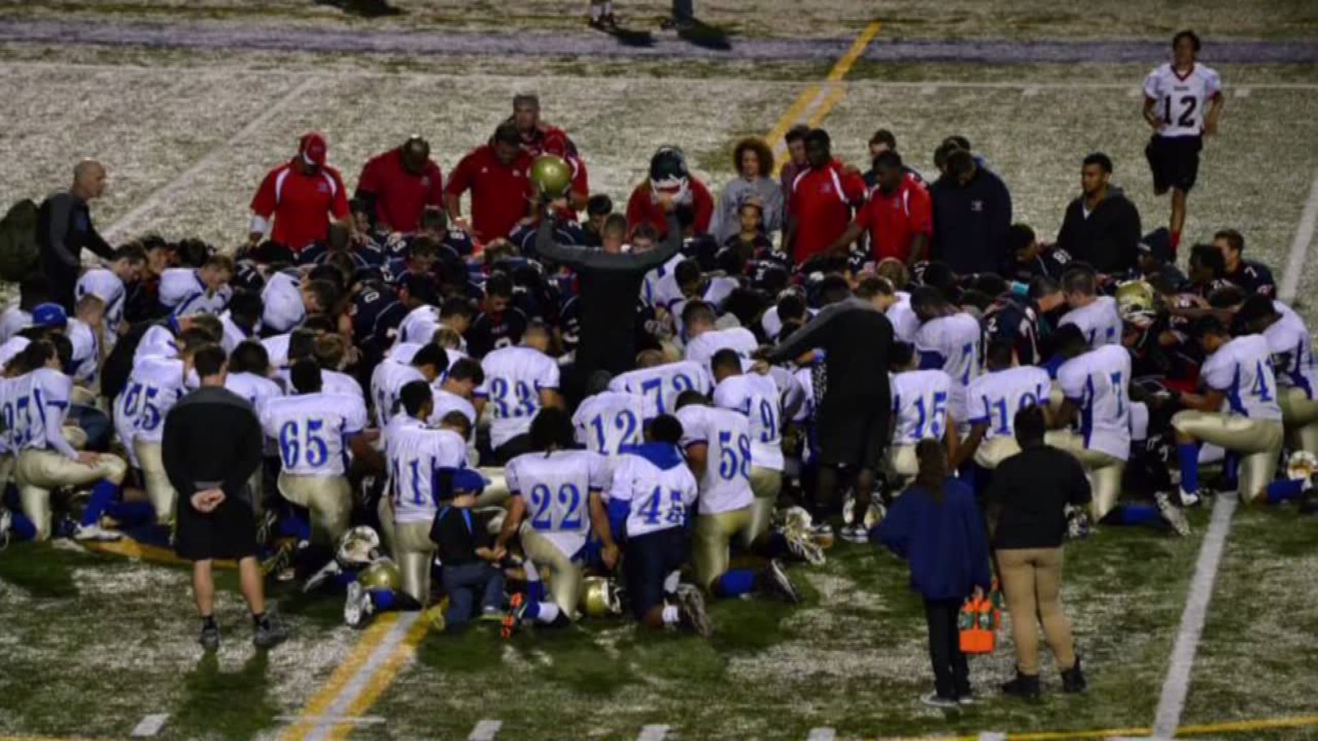 A Bremerton football coach is on paid leave for leading prayers with his players after games.