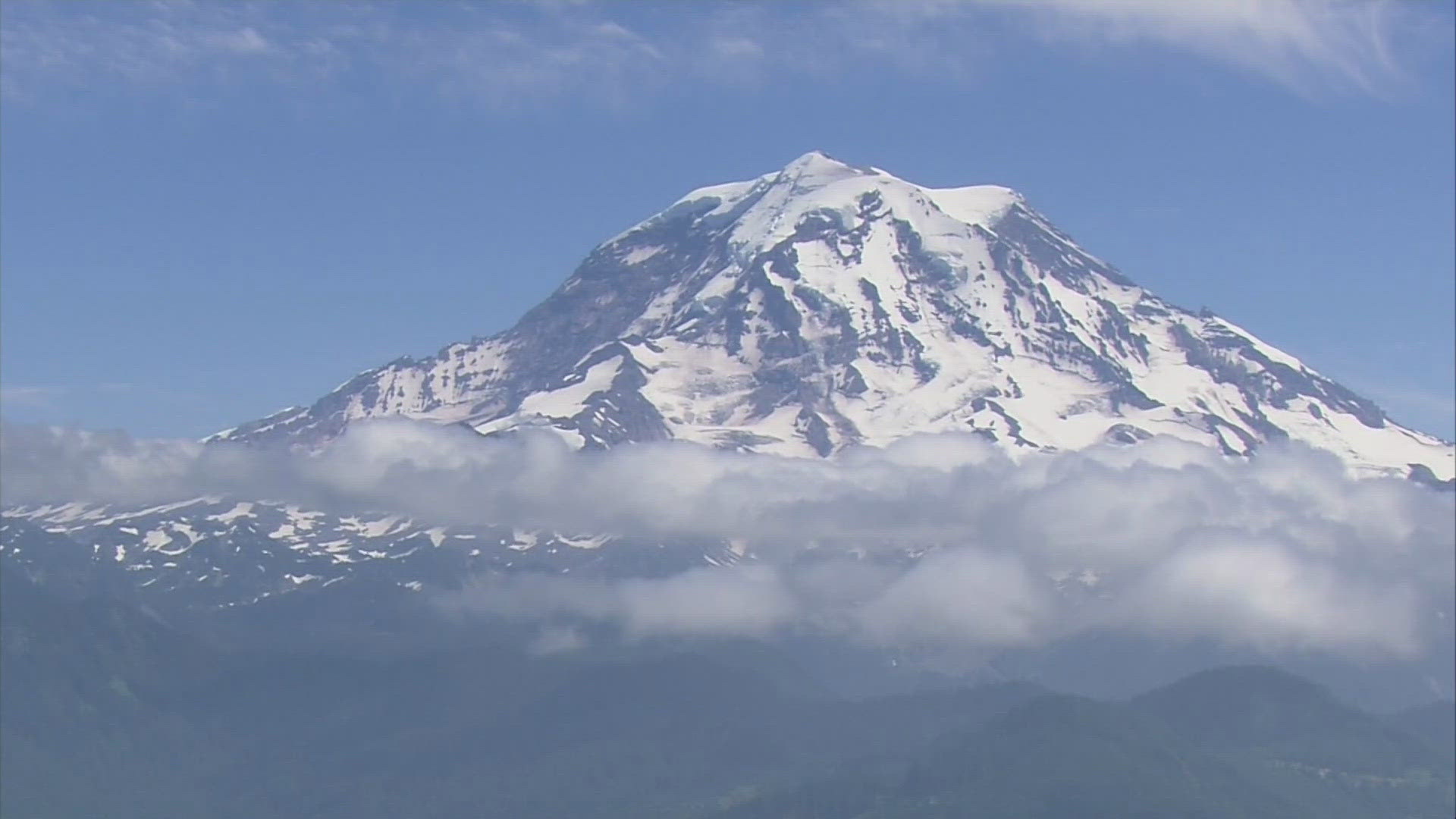 New measurements from a local researcher show Mount Rainier could have a new summit.