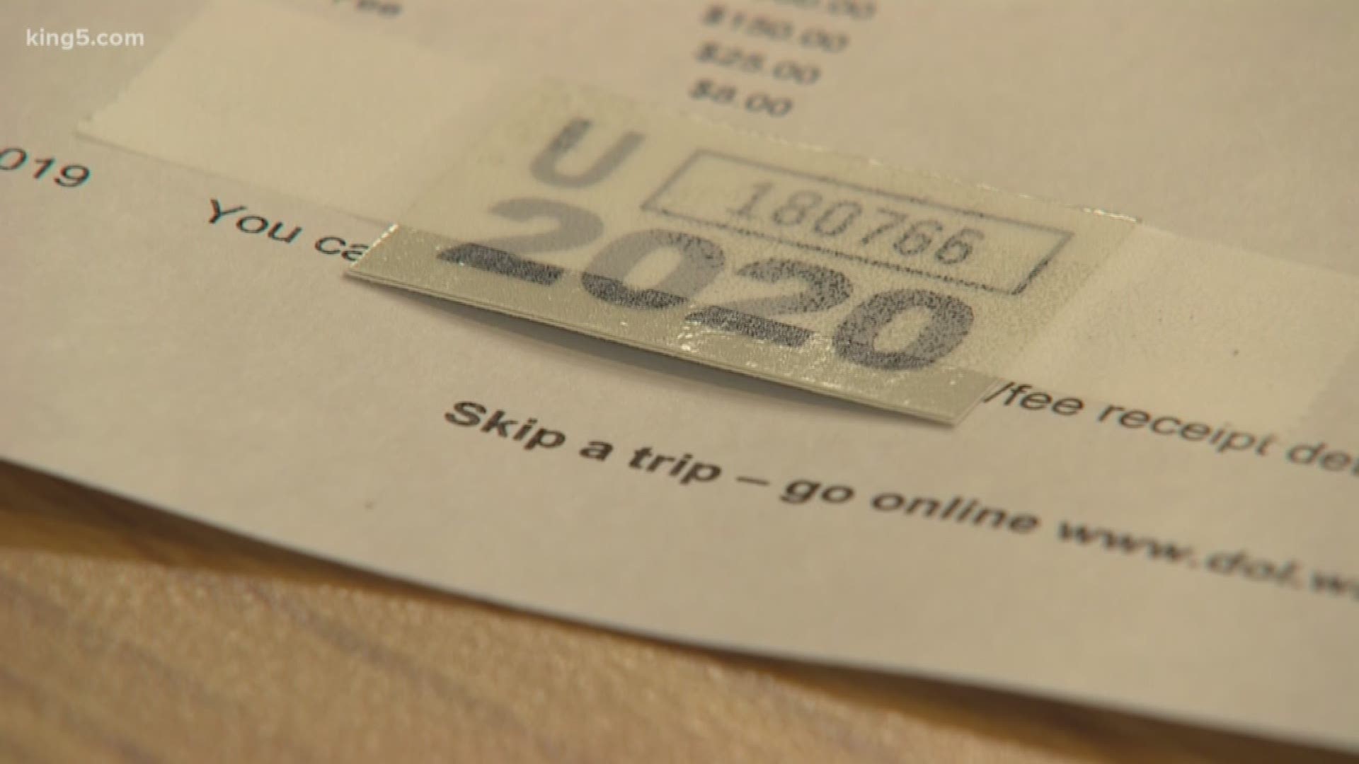 Washington's Department of Licensing says vehicle owners should pay their car-tab fees in full until it can figure out the full effects of Initiative 976.