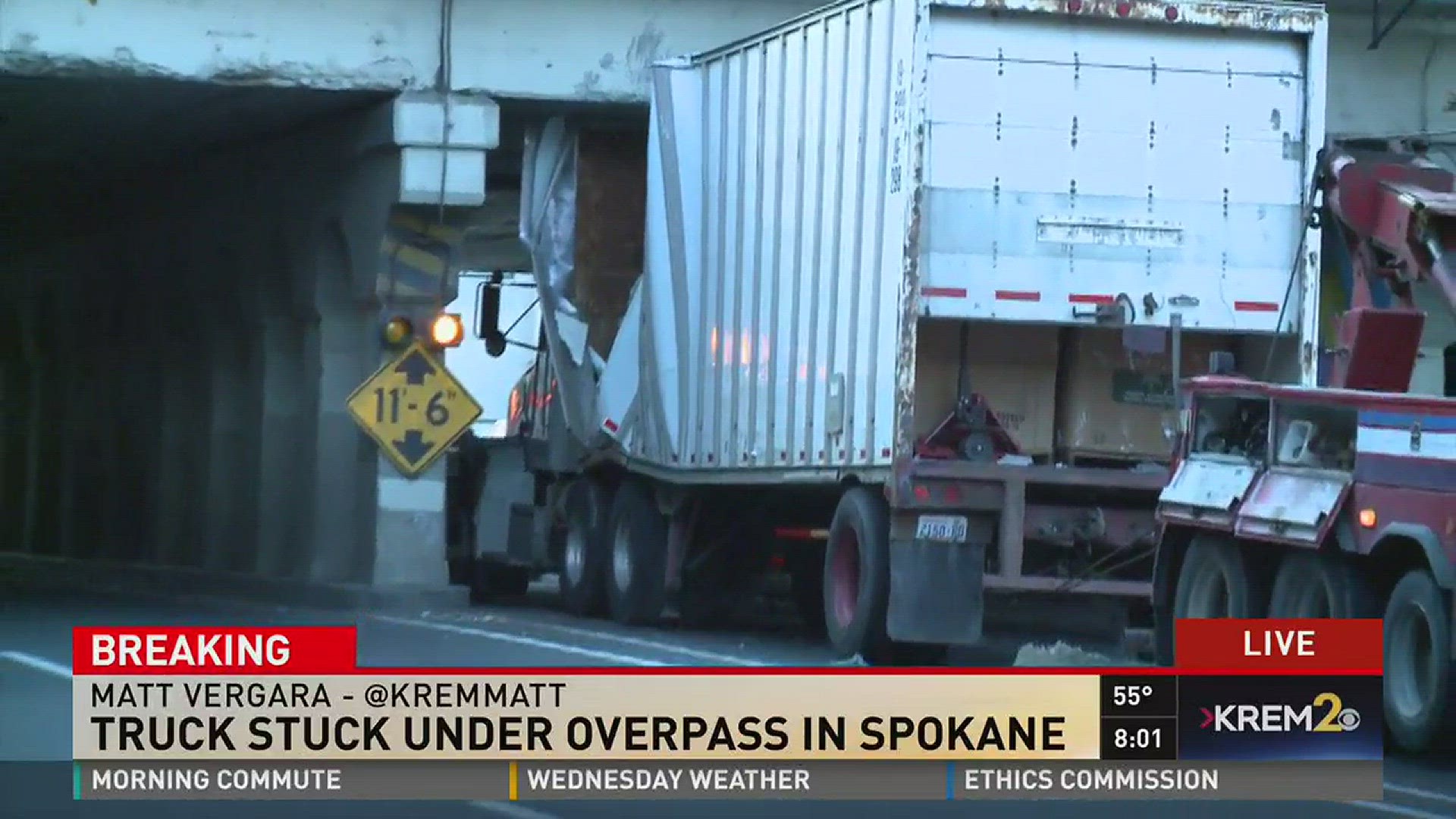 Truck stuck under overpass in Downtown Spokane