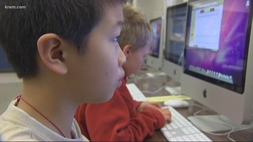Washington students return to class without masks
