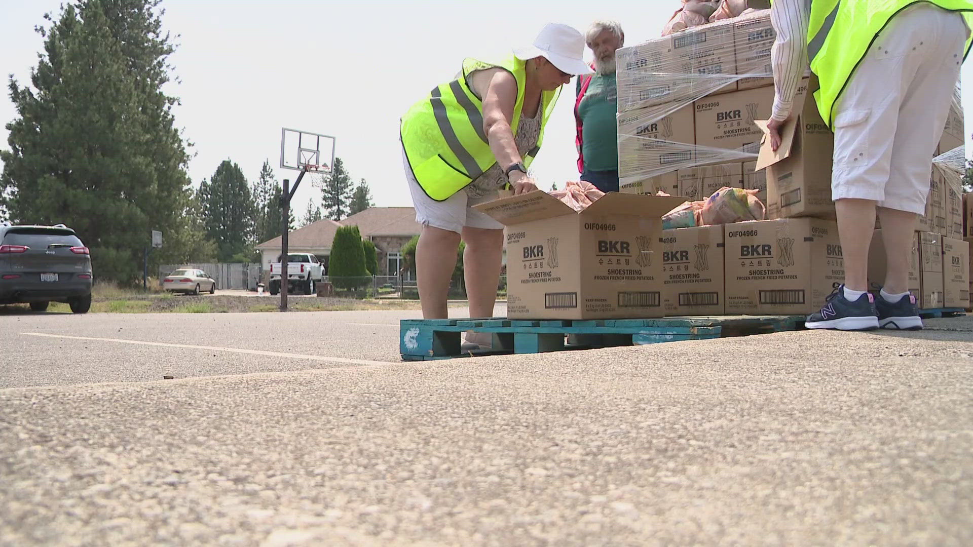 At two locations each Friday, Second Harvest and the Bite2Go program distribute bags of food to kids or their parents.