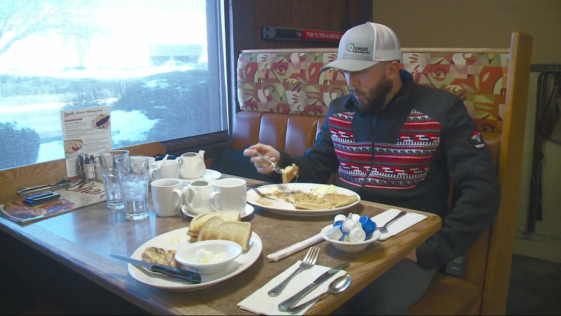 Brad Lammers is spending his Saturday eating waffles at the North Spokane Shari's Restaurant after losing a bet.