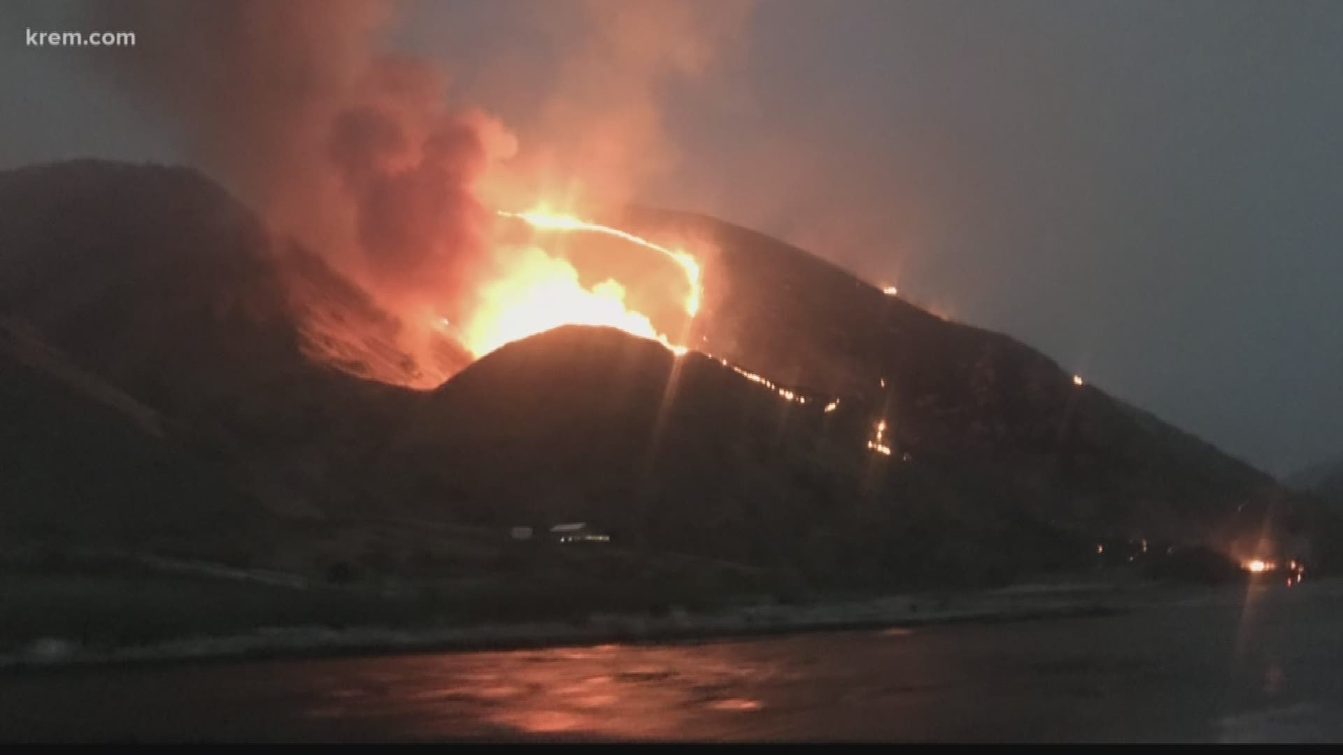 A wildfire burning in Hells Canyon has destroyed one structure and is threatening others. One resident said the destroyed structure is an iconic spot in the area.