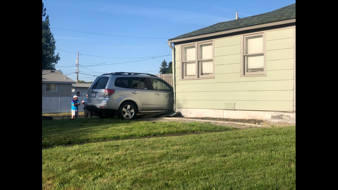 Car nearly crashes into Spokane home, another rolls on side | krem.com