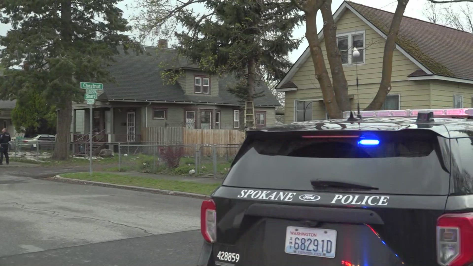 At this time, KREM 2 knows a house on 2100 West Sharp is surrounded. However, we are not sure what the response is for.