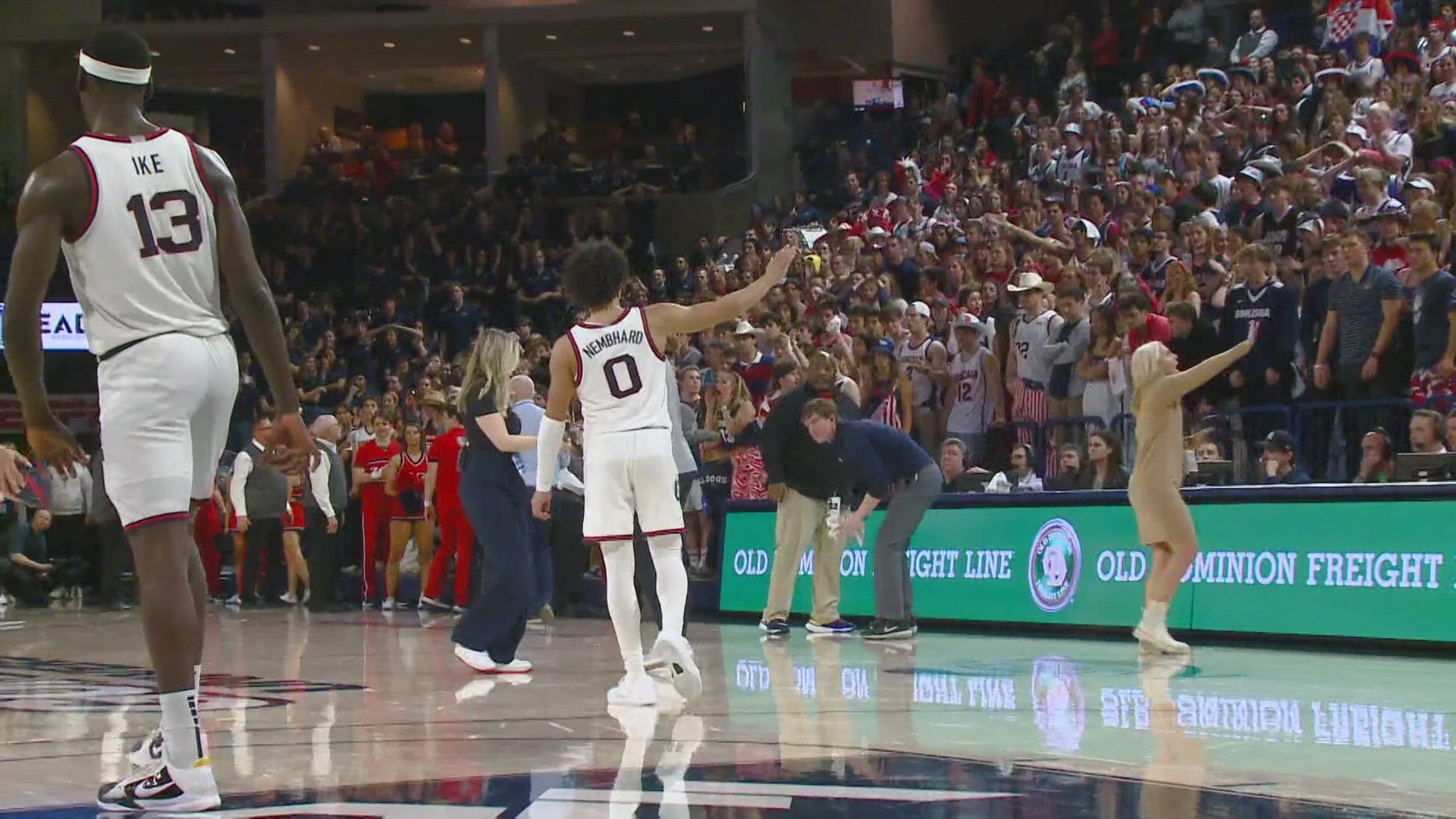 Fans littered the court following a no call late in Saturday's game