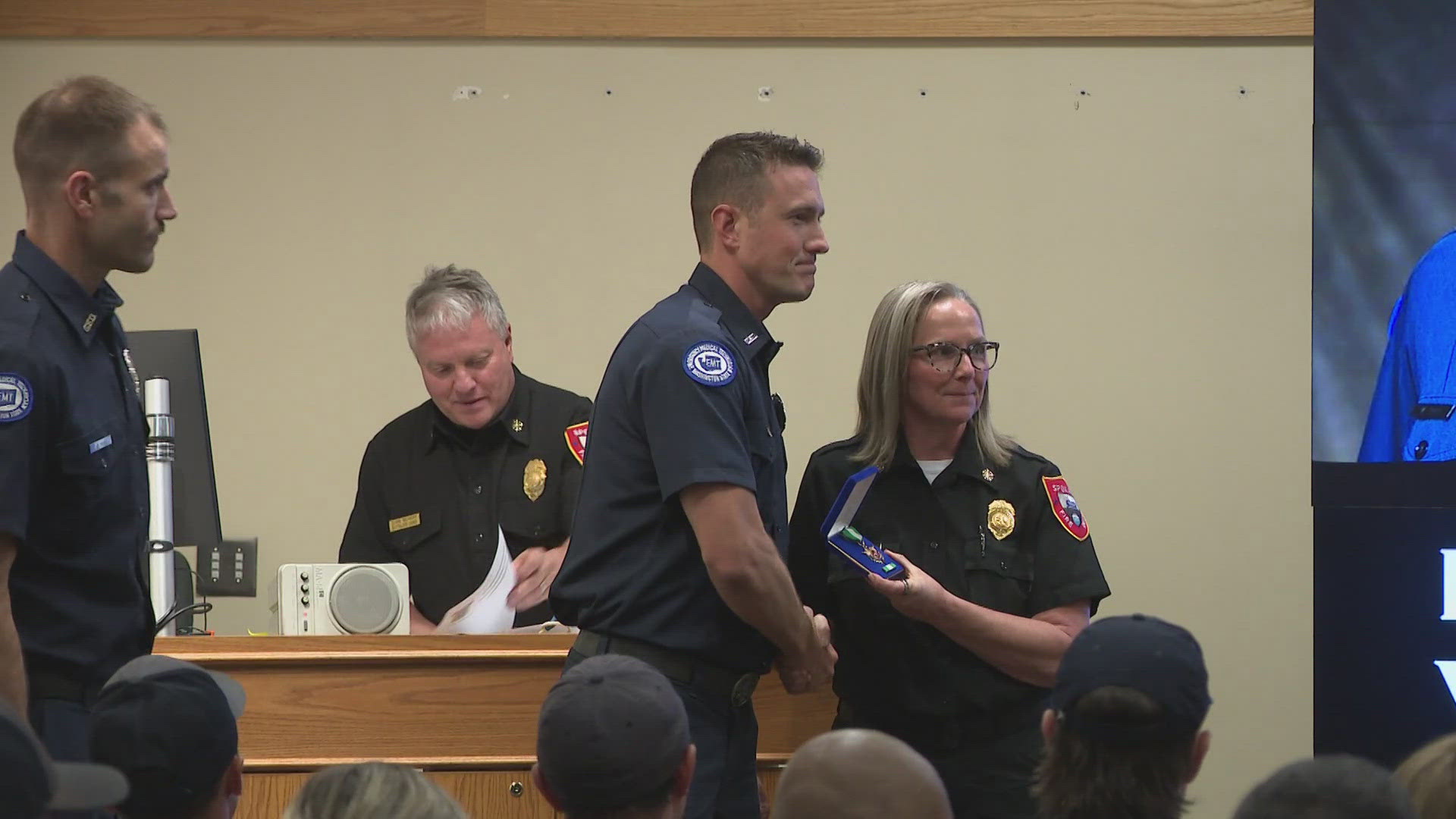 Two firefighters received the Medal of Valor after responding to a deadly fire this year.