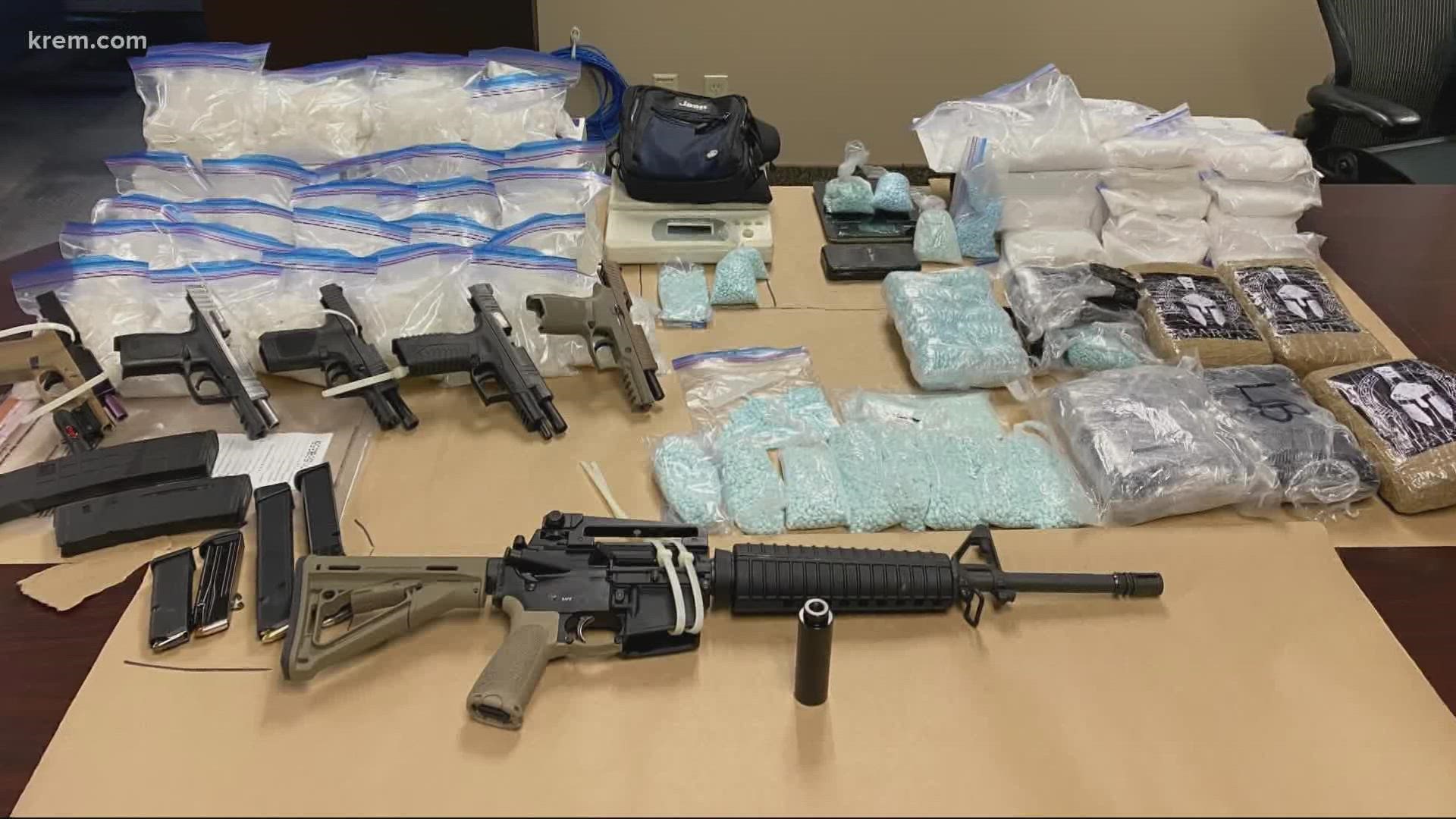 Approximately 35 pounds of methamphetamine, 50,000 fake pills believed to contain fentanyl and seven guns were seized.
