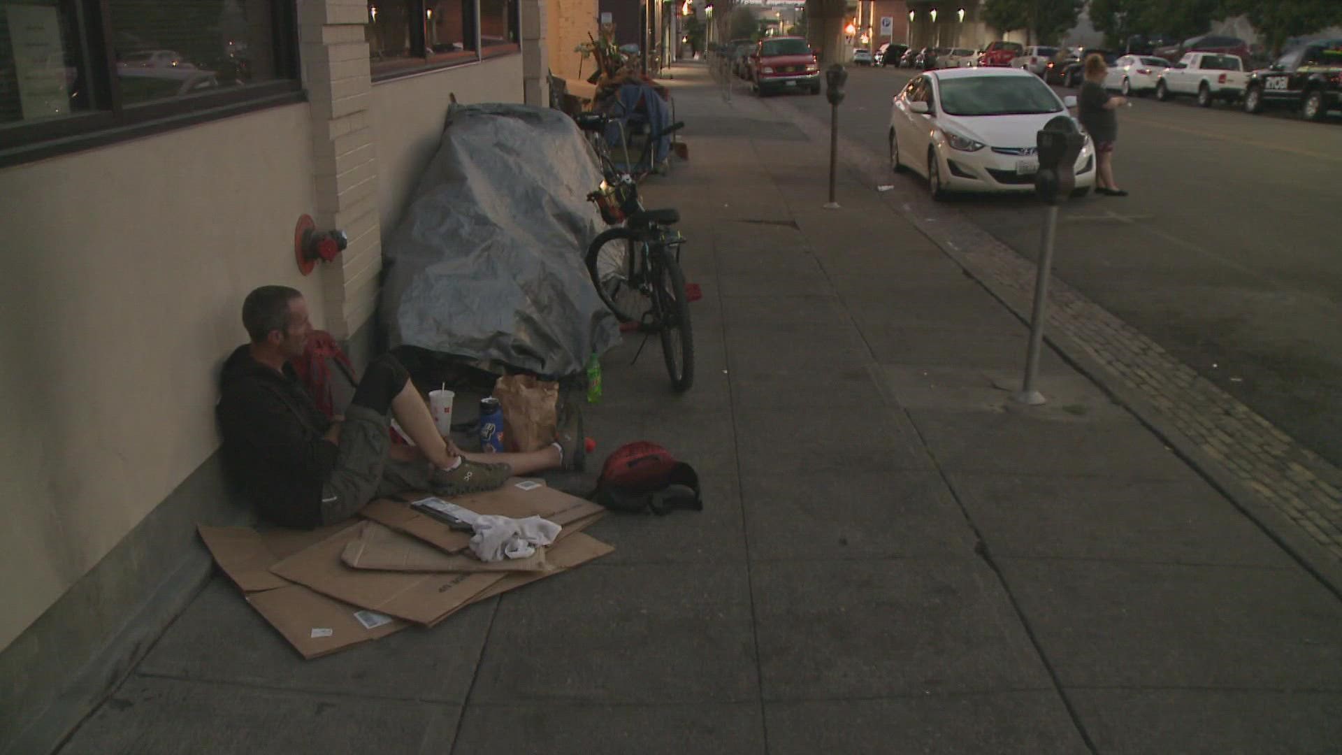 Under Spokane's current ordinance, camping is not allowed on public property and a person cannot sit or lie on the sidewalk between 6 a.m. and midnight.