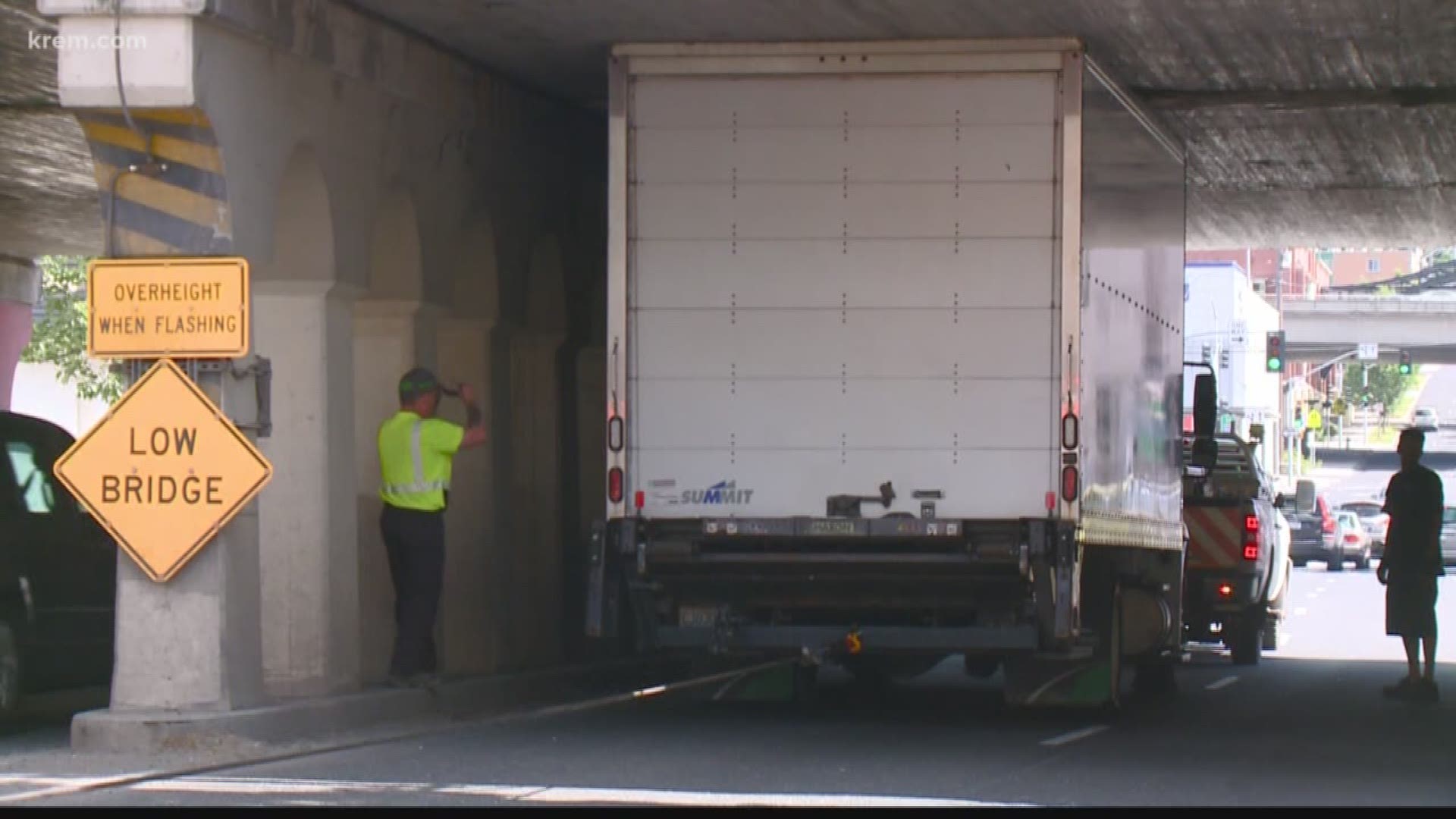 Another truck had to be towed out from under the Stevens St. bridge.