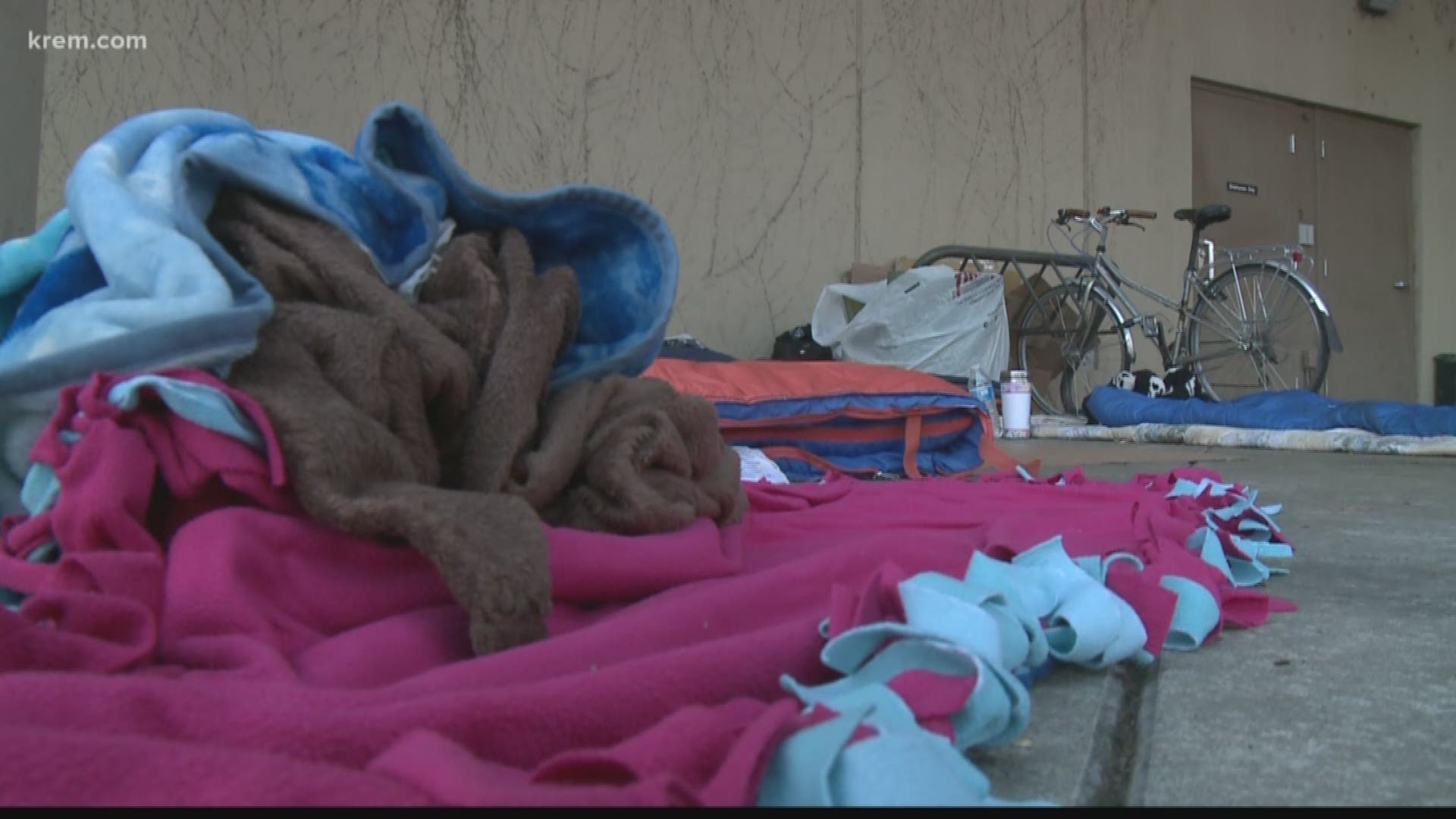 The city of Spokane is temporarily suspending the "sit and lie" ordinance. The council's action currently says the ordinance can't be enforced until 30 days after 200 more beds are made available.