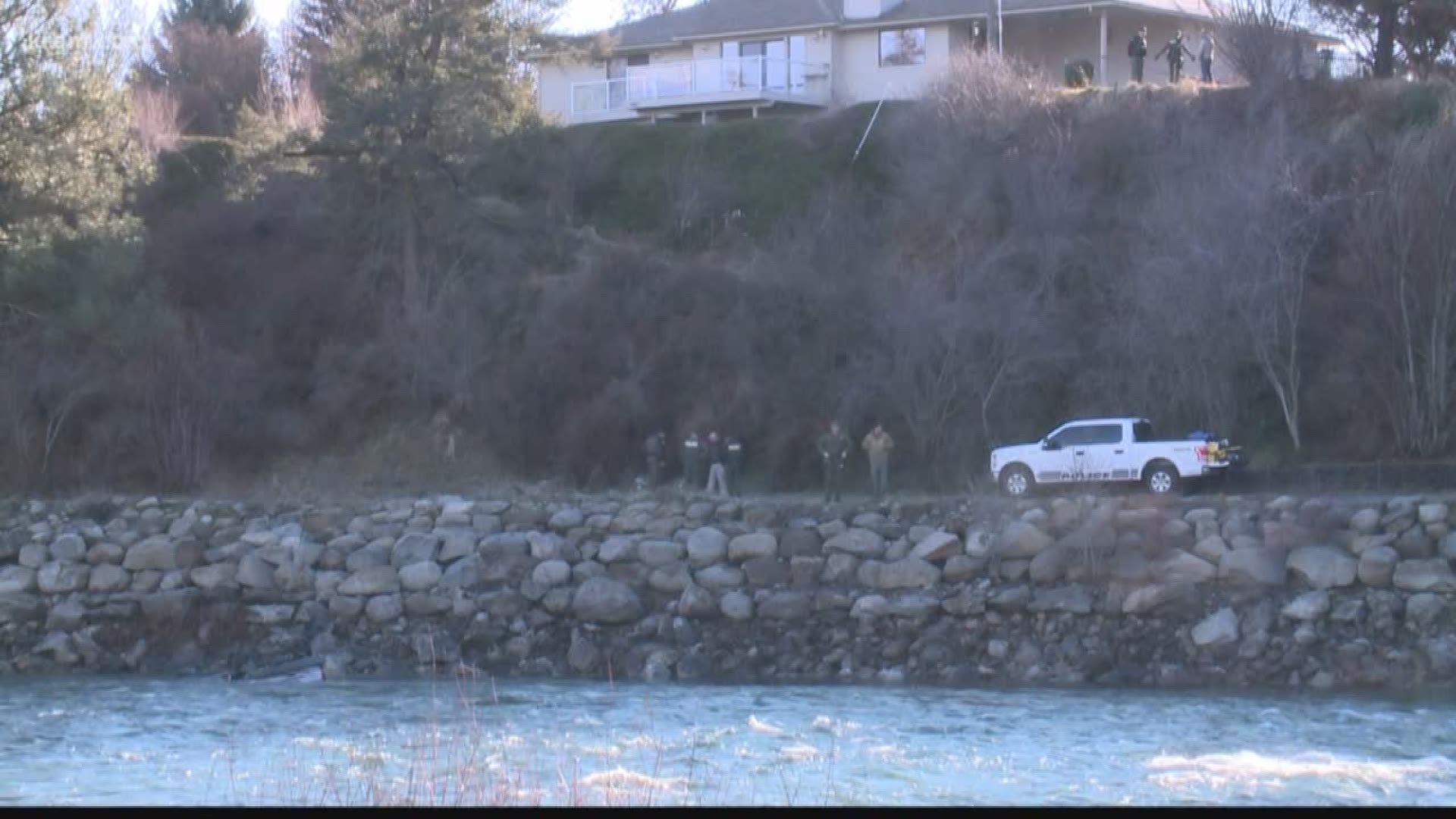 A woman is dead after Spokane Valley firefighters pulled her from an overturned vehicle in the Spokane River. Firefighters say someone spotted the vehicle from the Centennial Trail in Spokane Valley just before 9 Wednesday morning.