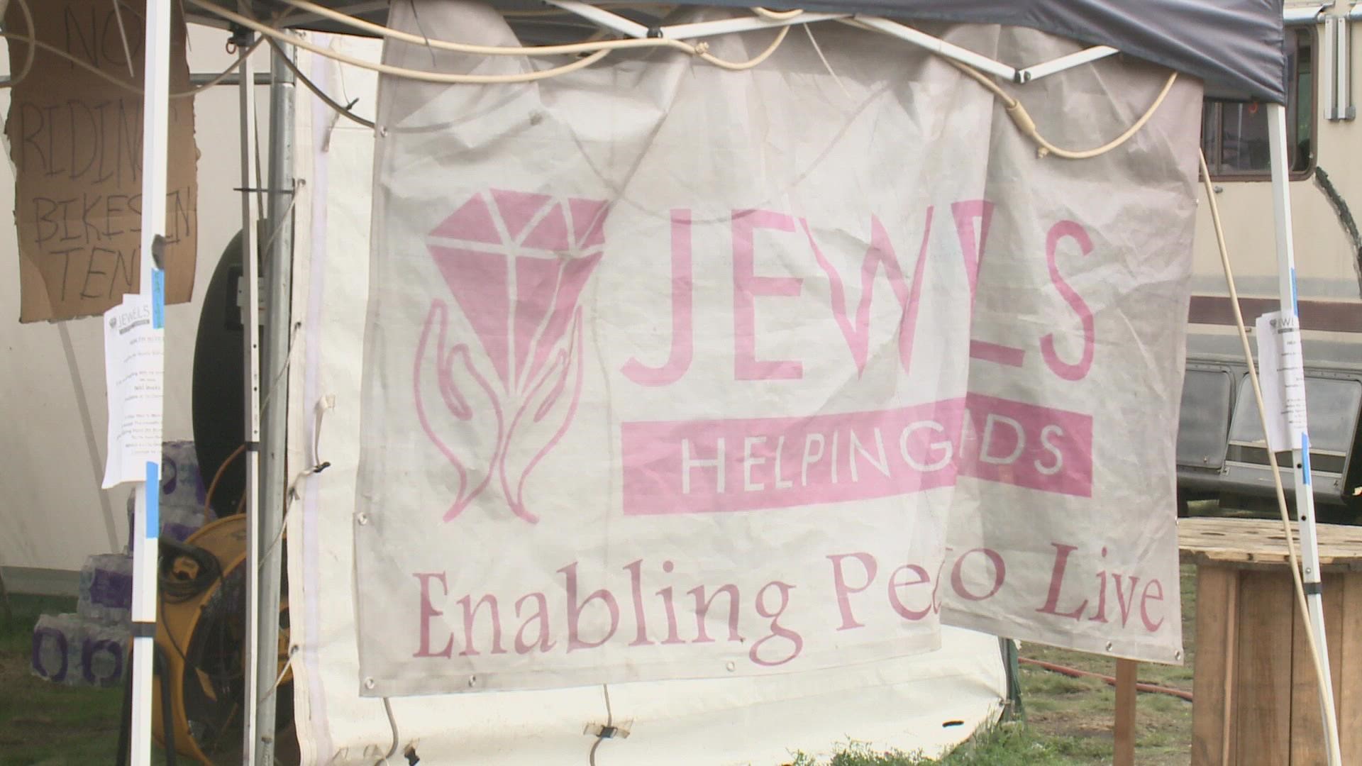 As the City looks toward clearing out the homeless encampment near I-90 and Freya, non-profits are hiring staff to ease the transition.