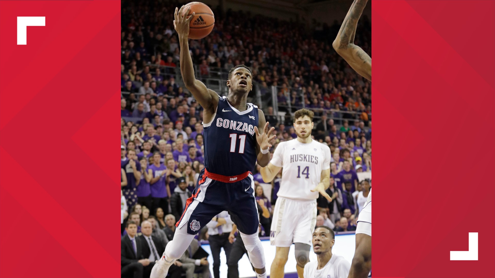 Joel Ayayi hits a big three with 24 seconds to go to seal the win for the Zags.