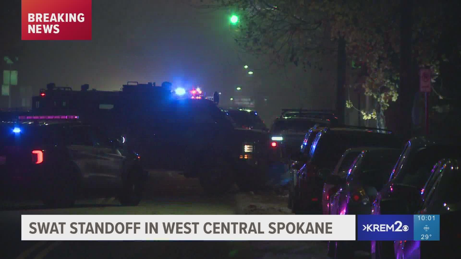This standoff is happening near the corner of Ash and Boone. KREM 2 hasn't been able to confirm the suspect's name or what they are wanted for.