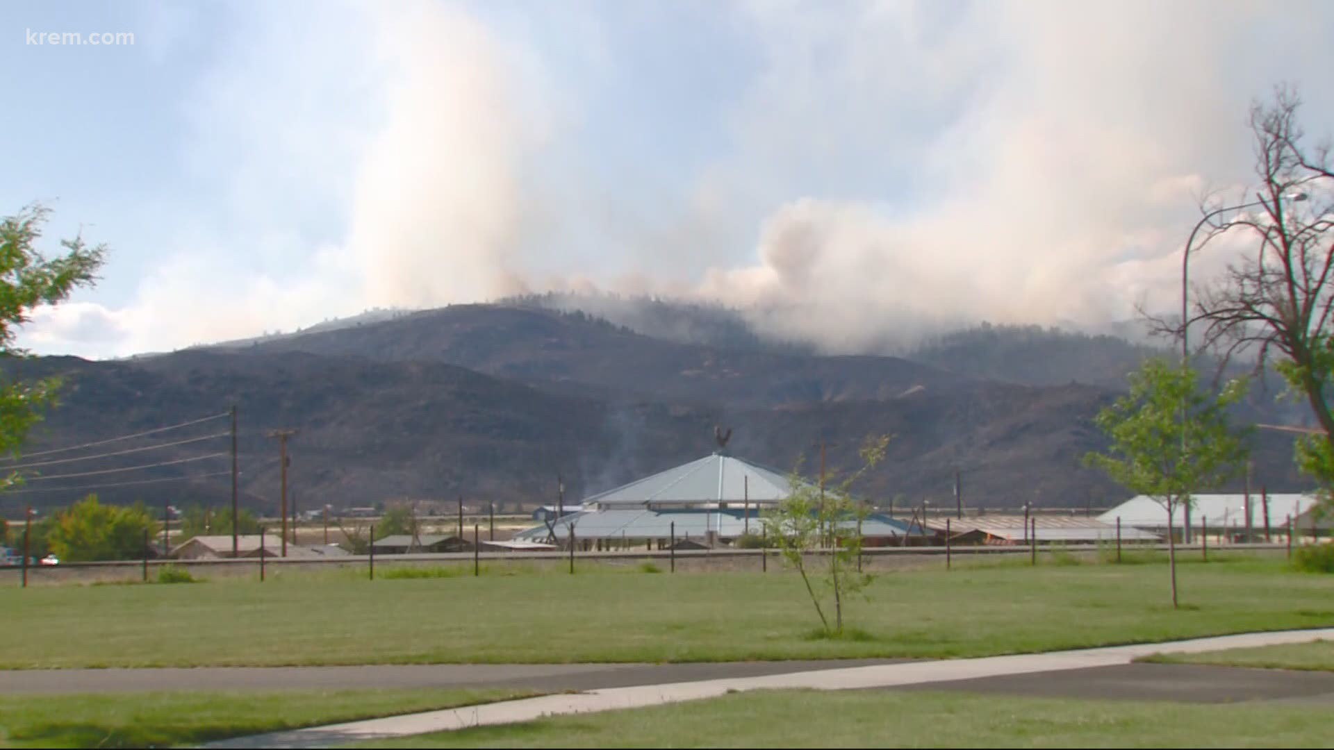 The fire is burning west of Nespelem and the cause is under investigation. The blaze started at 2:40 p.m. Thursday and the Nespelem School is threatened.