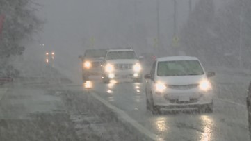 Snow makes sudden return in Spokane with brief white out conditions along I-90