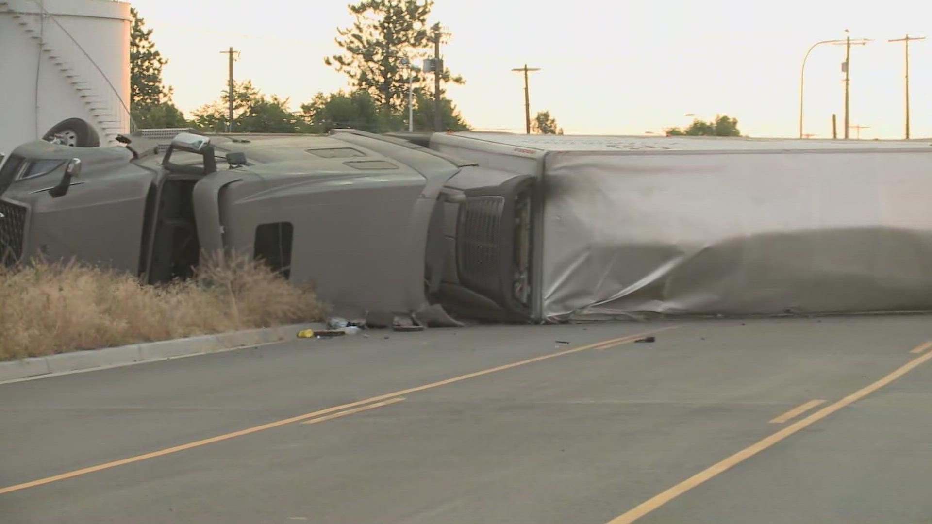 WSP says the driver swerved in front of the semi-truck, causing it to roll off the interstate.