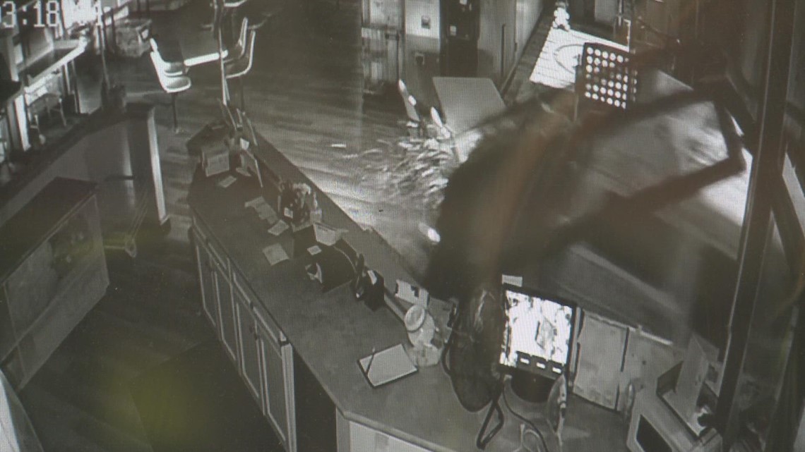 Surveillance video captures Jeep crashing through doors of Laundry Land in Spokane | RAW