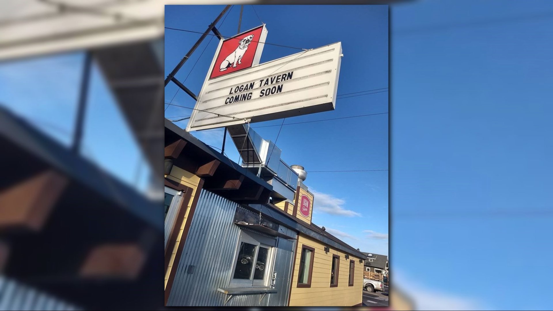 Logan neighborhood bar celebrates grand opening with smiling staff