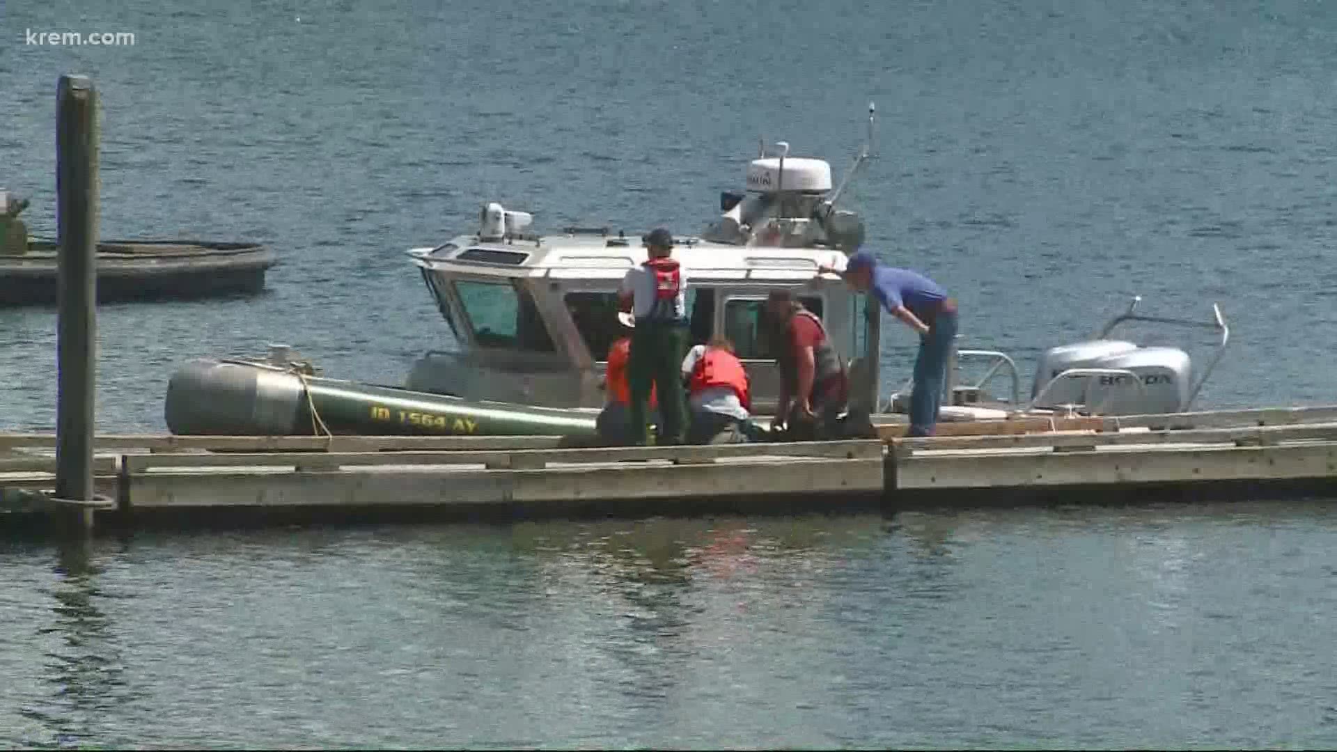 Authorities closed off the Loffs Bay boat launch on the Western edge of Lake Coeur d'Alene so that crews could launch a large crane on a barge to the crash site.