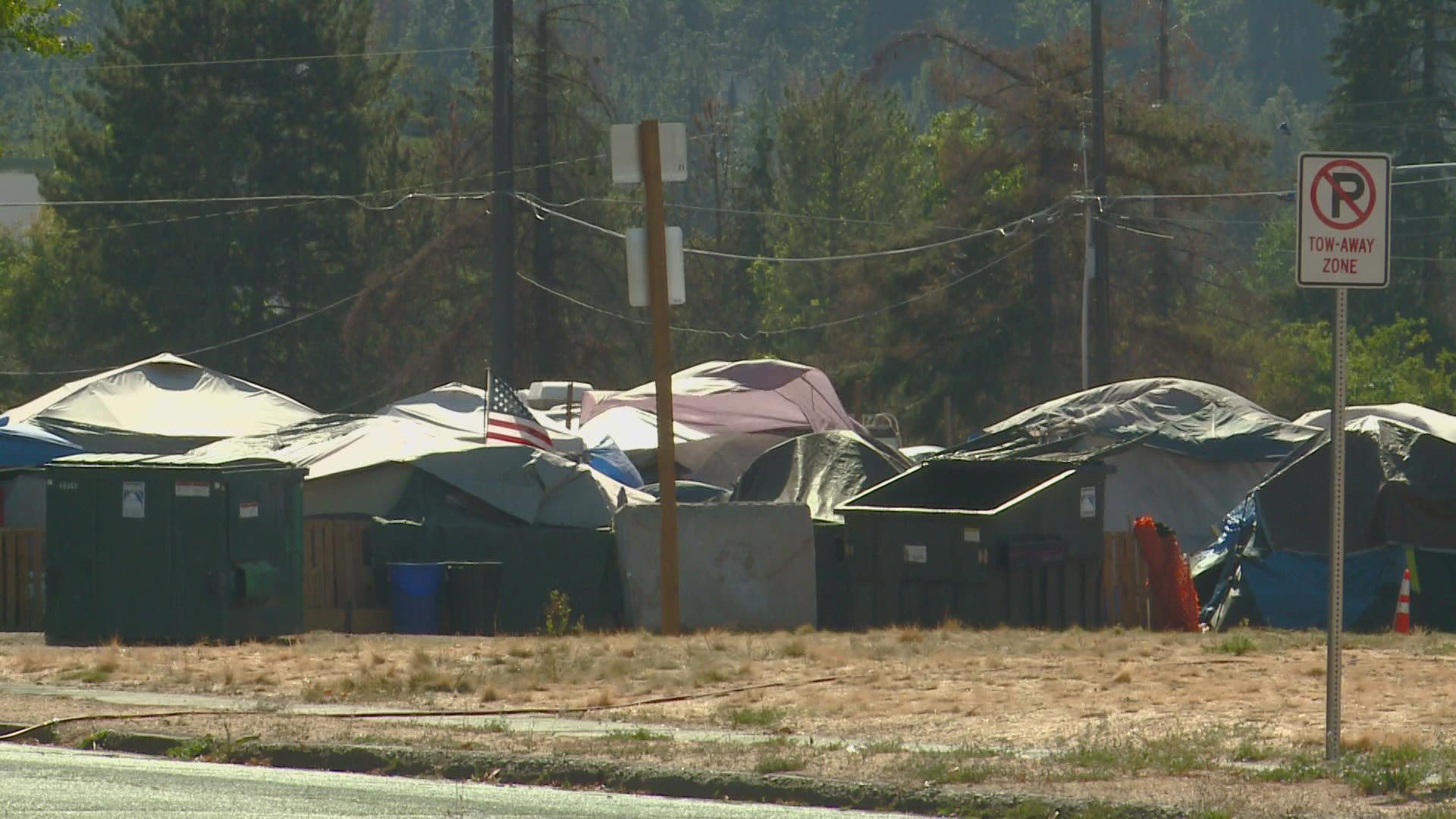 Neighbors living close to the area where the homeless camp near I-90 is located said they have been living with increased crime and noise for months.