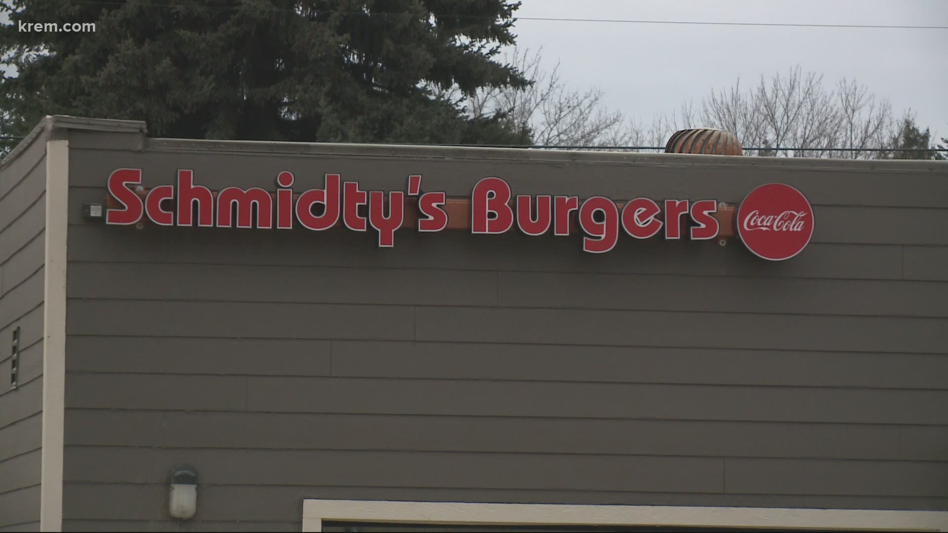 The owners of Schmidty’s Burgers hoped they would be reopened by now, but COVID-19 protocols have held up the renovation of their new restaurant.