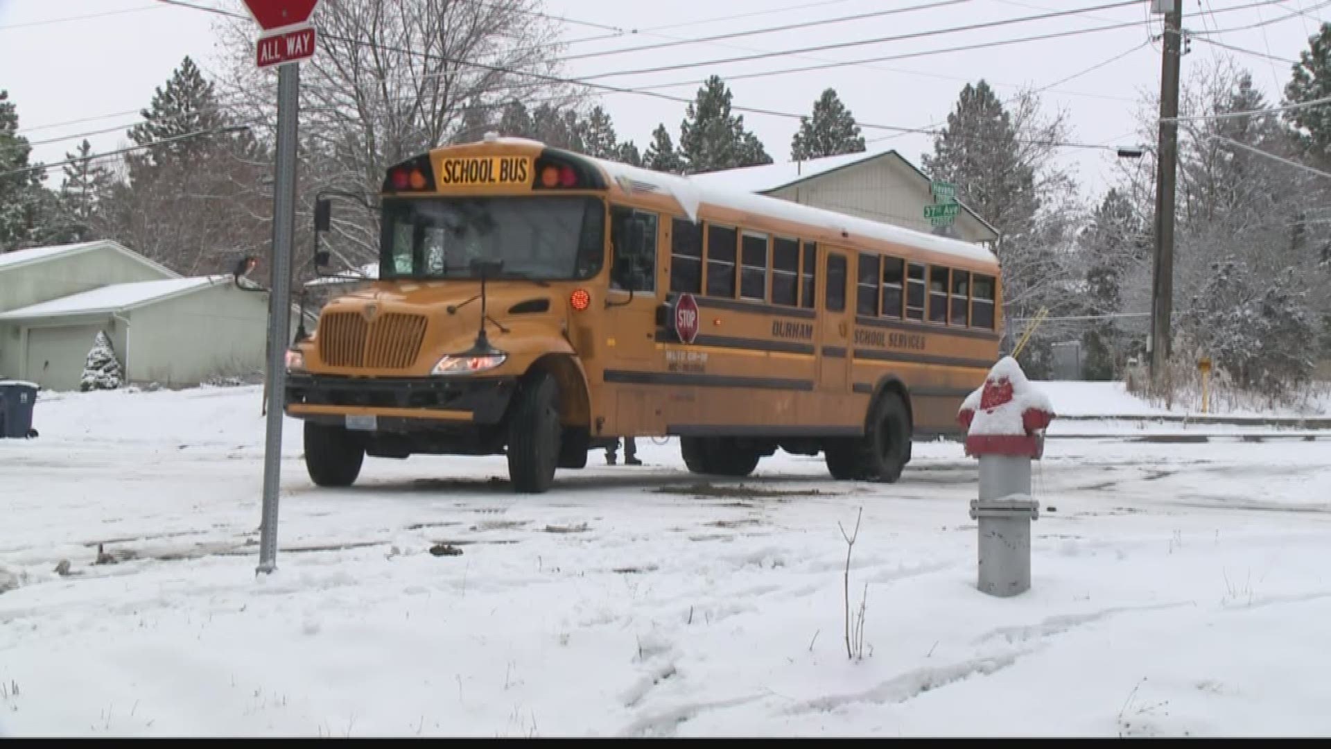 A Spokane Public Schools bus slid off the road on Havana Street on Wednesday after 2 inches of snow fell overnight and into the morning. No students were injured.