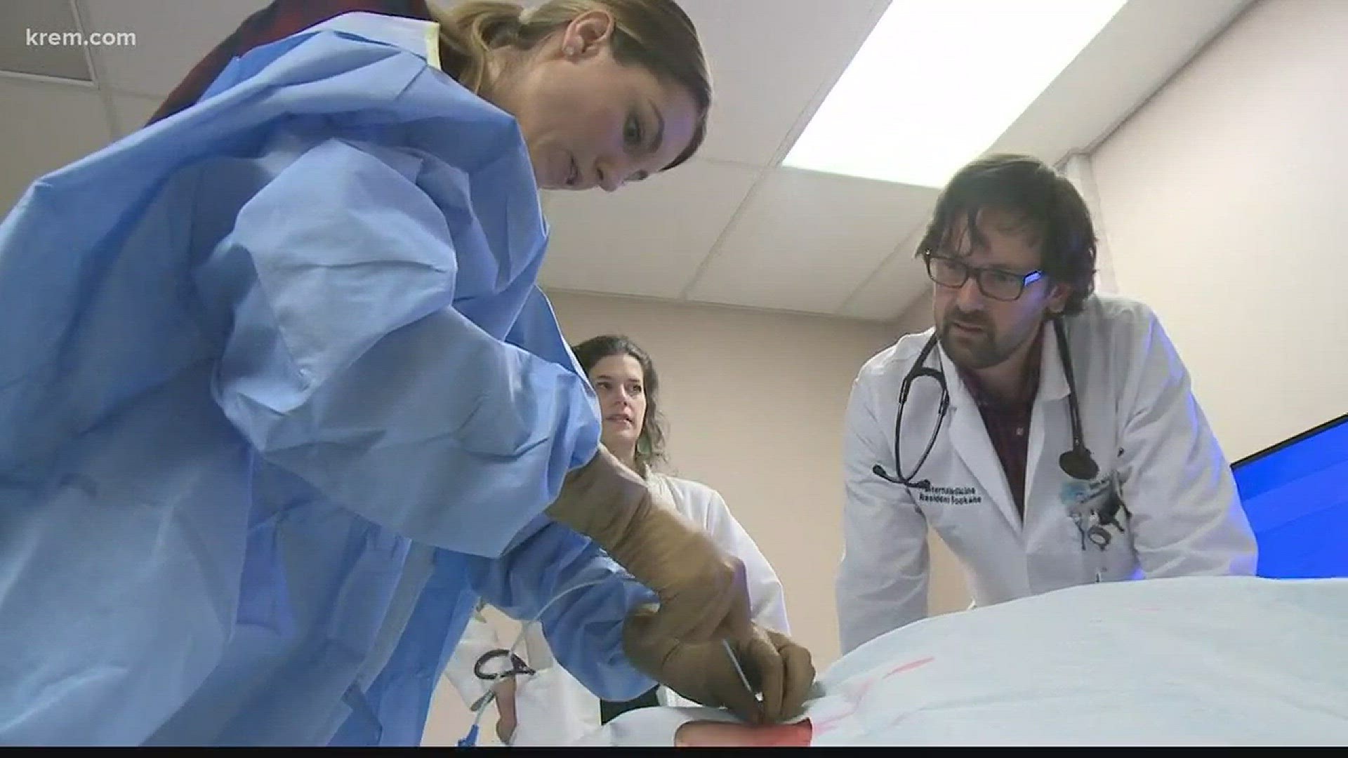 Current and future medical professionals like Resident Physician Lucy Ledyard practice their technical skills on robotic patients before treating human patients.