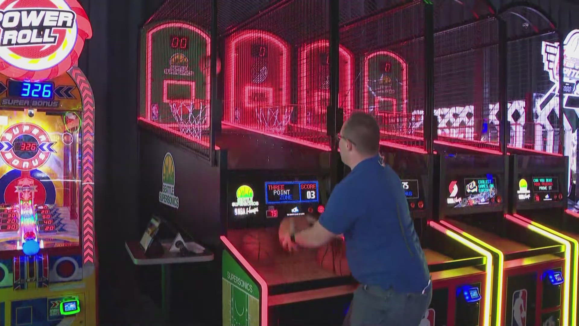 The 23,520-square-foot location will feature over 100 arcade games, food, drinks and a 40-foot "WOW" Wall for sports fans.