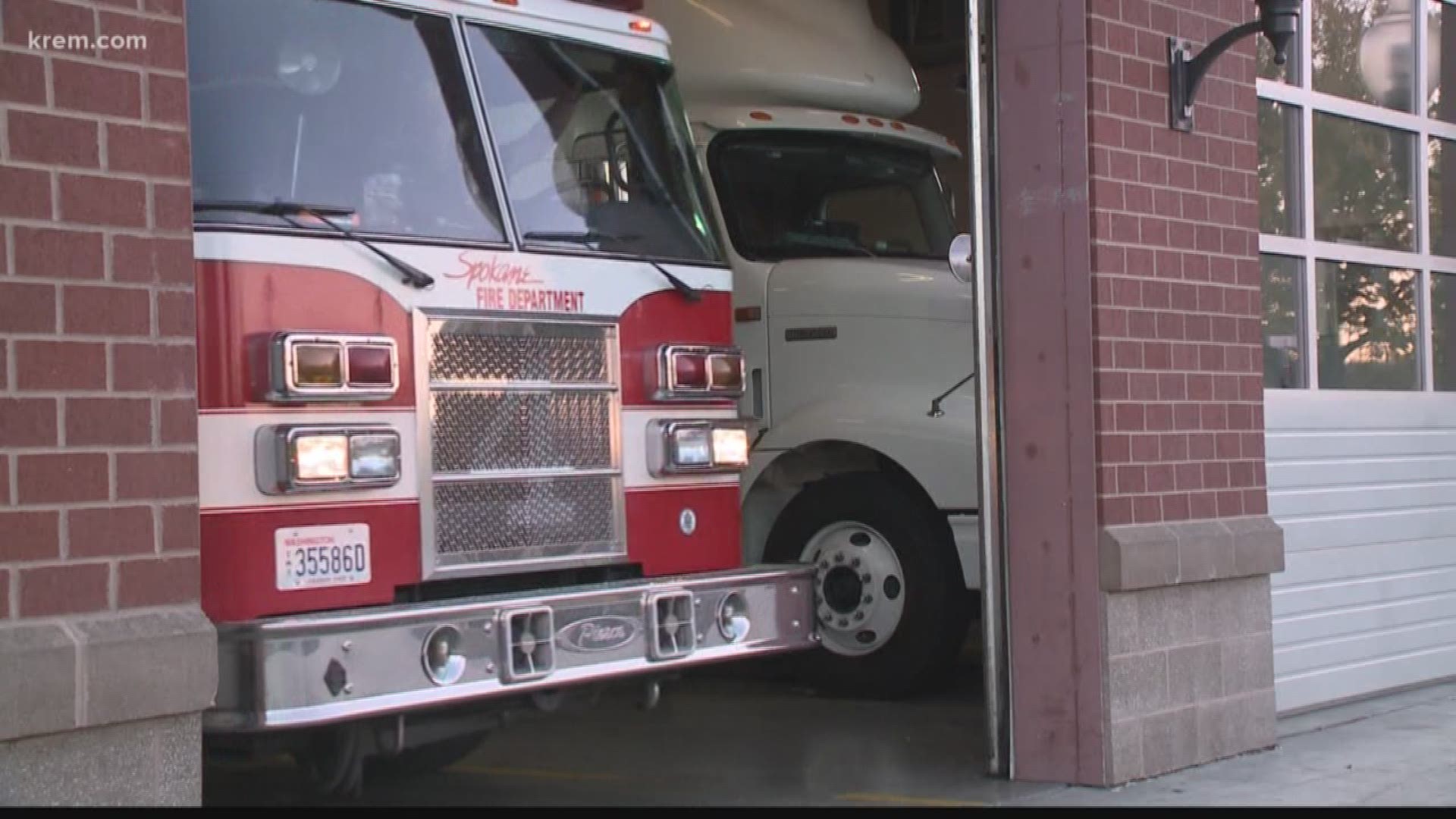 Spokane Fire Chief Brian Schaeffer said eight of the firefighters are showing symptoms and one is hospitalized.