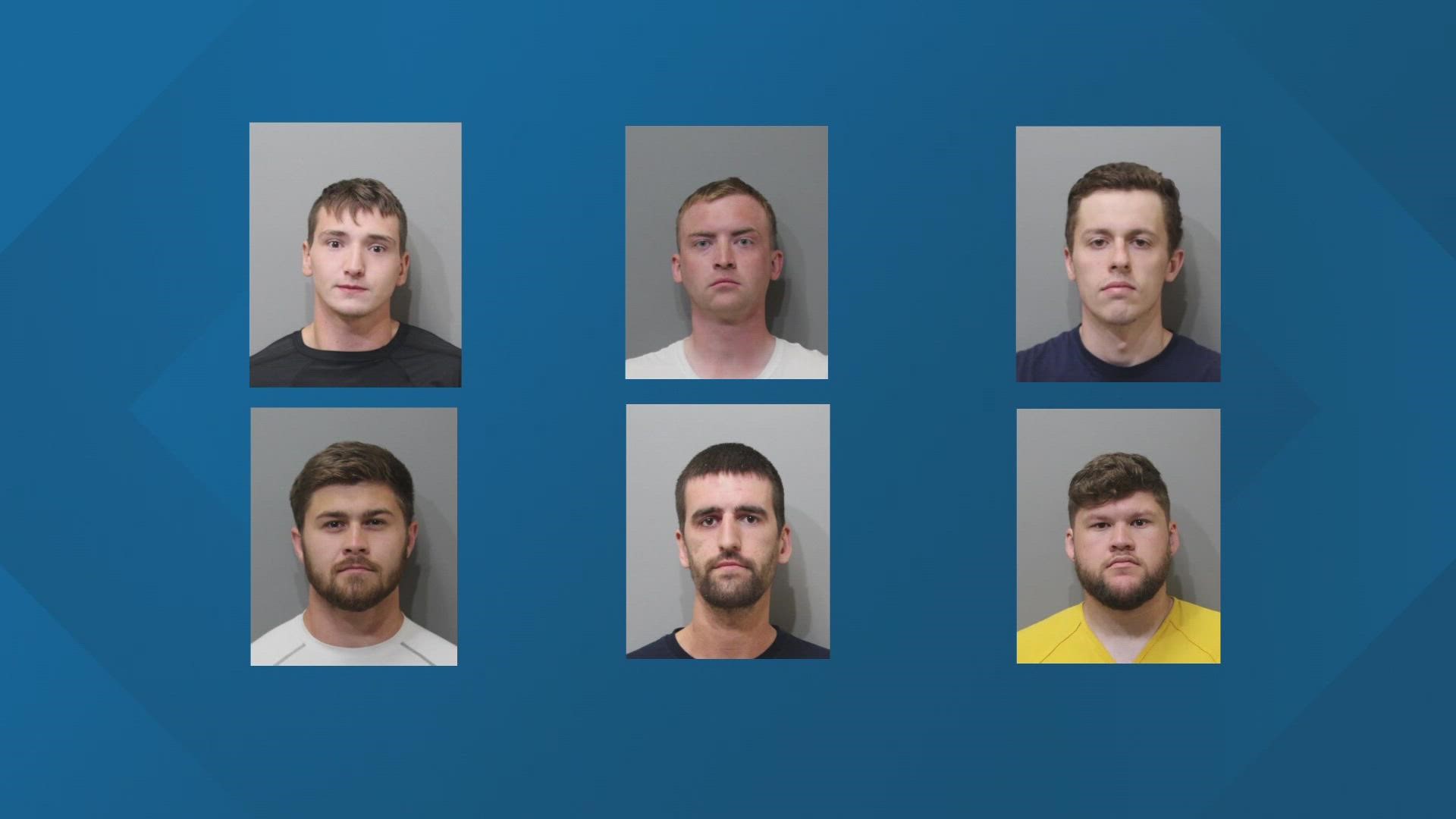 All six men pleaded not guilty to conspiracy to riot.